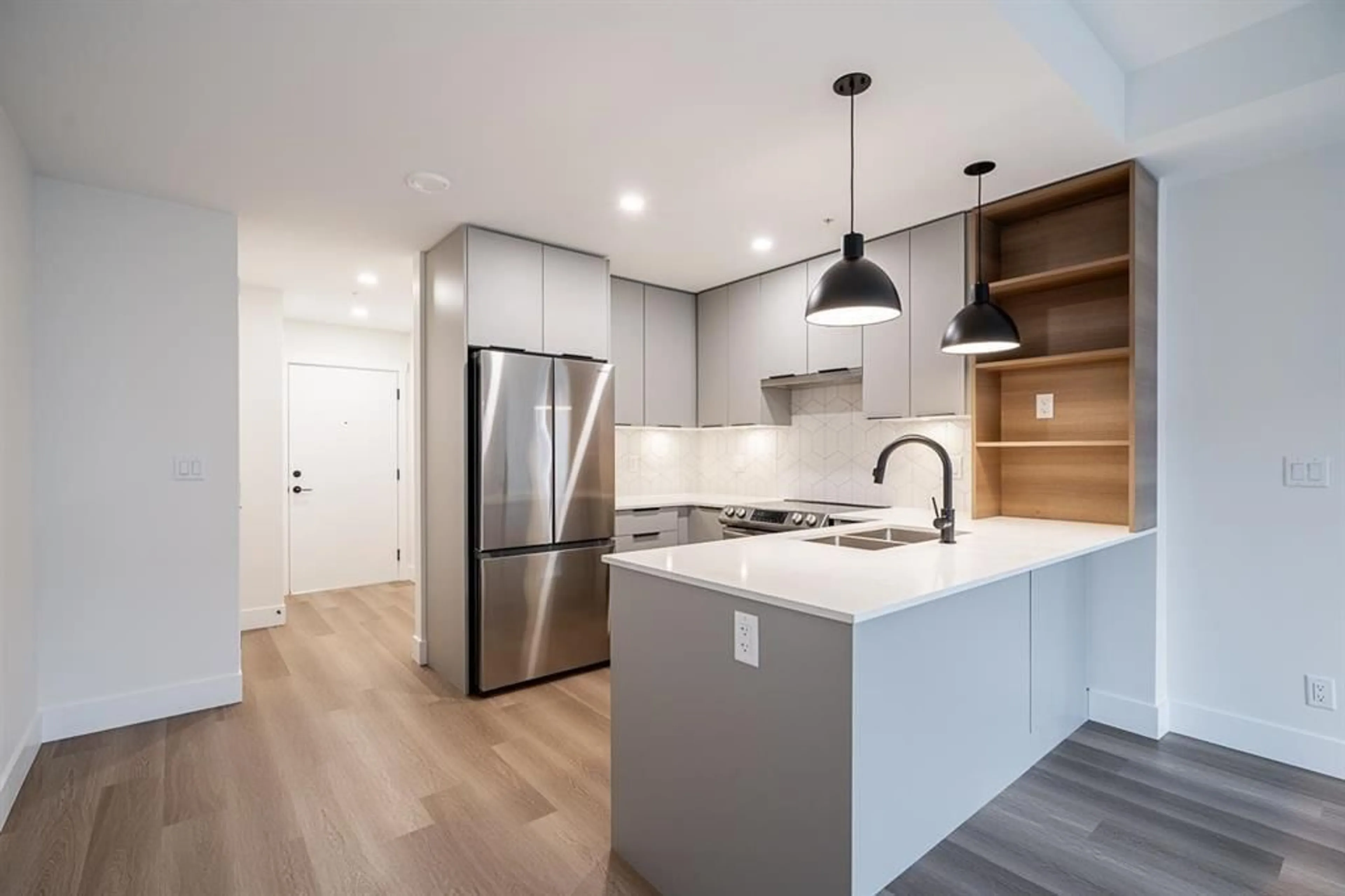 Open concept kitchen, unknown for 405 - 10778 138, Surrey British Columbia V3T5T2