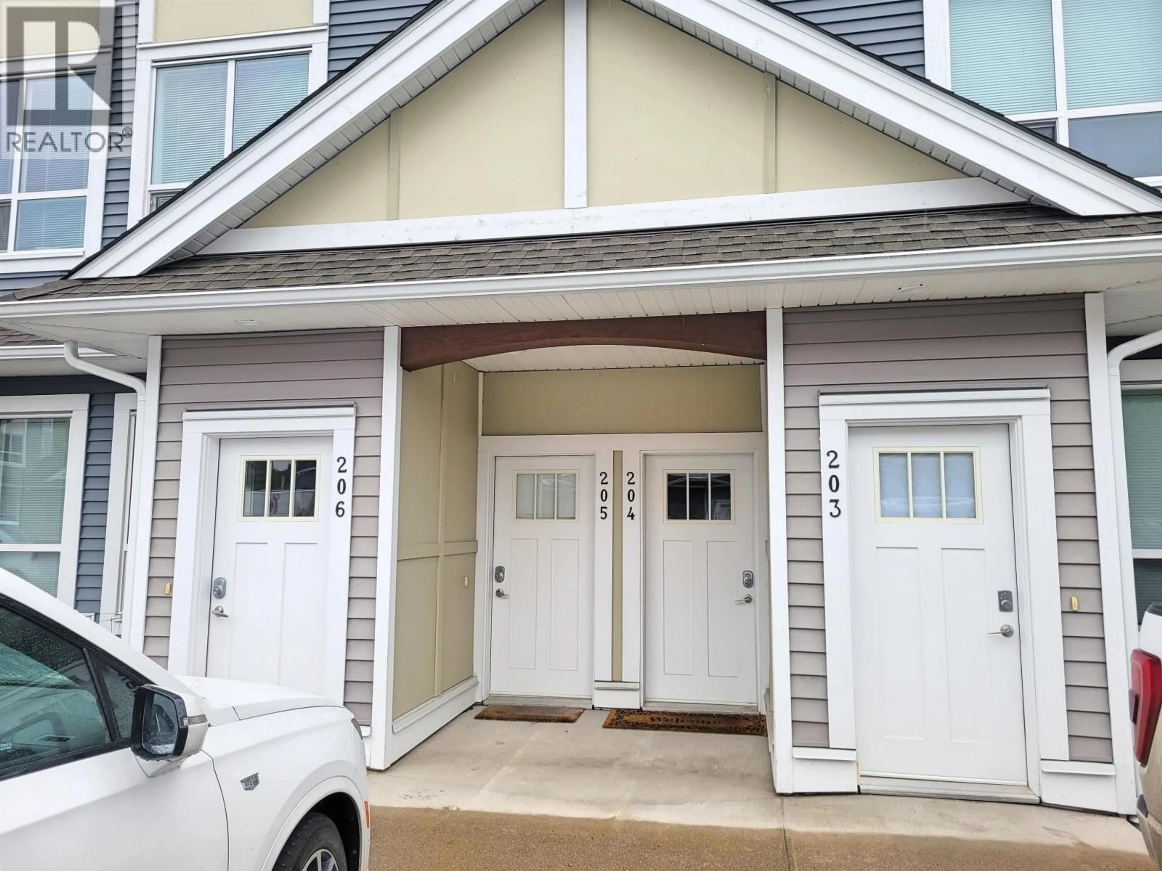 Home with vinyl exterior material, street for 205 - 110 BAXTER AVENUE, Kitimat British Columbia V8C2N9