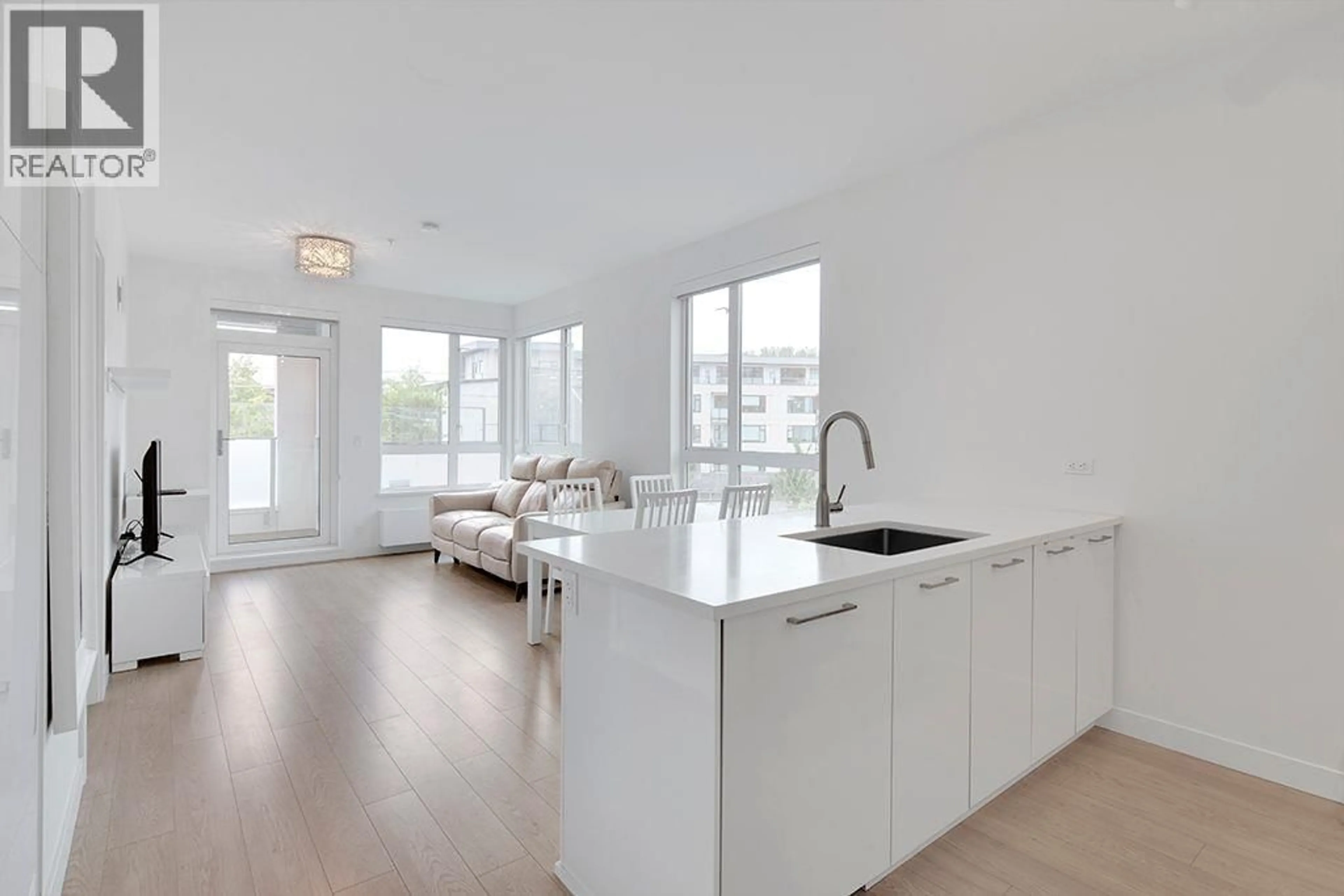 Open concept kitchen, unknown for 308 - 711 14TH STREET, North Vancouver British Columbia V7M3E8