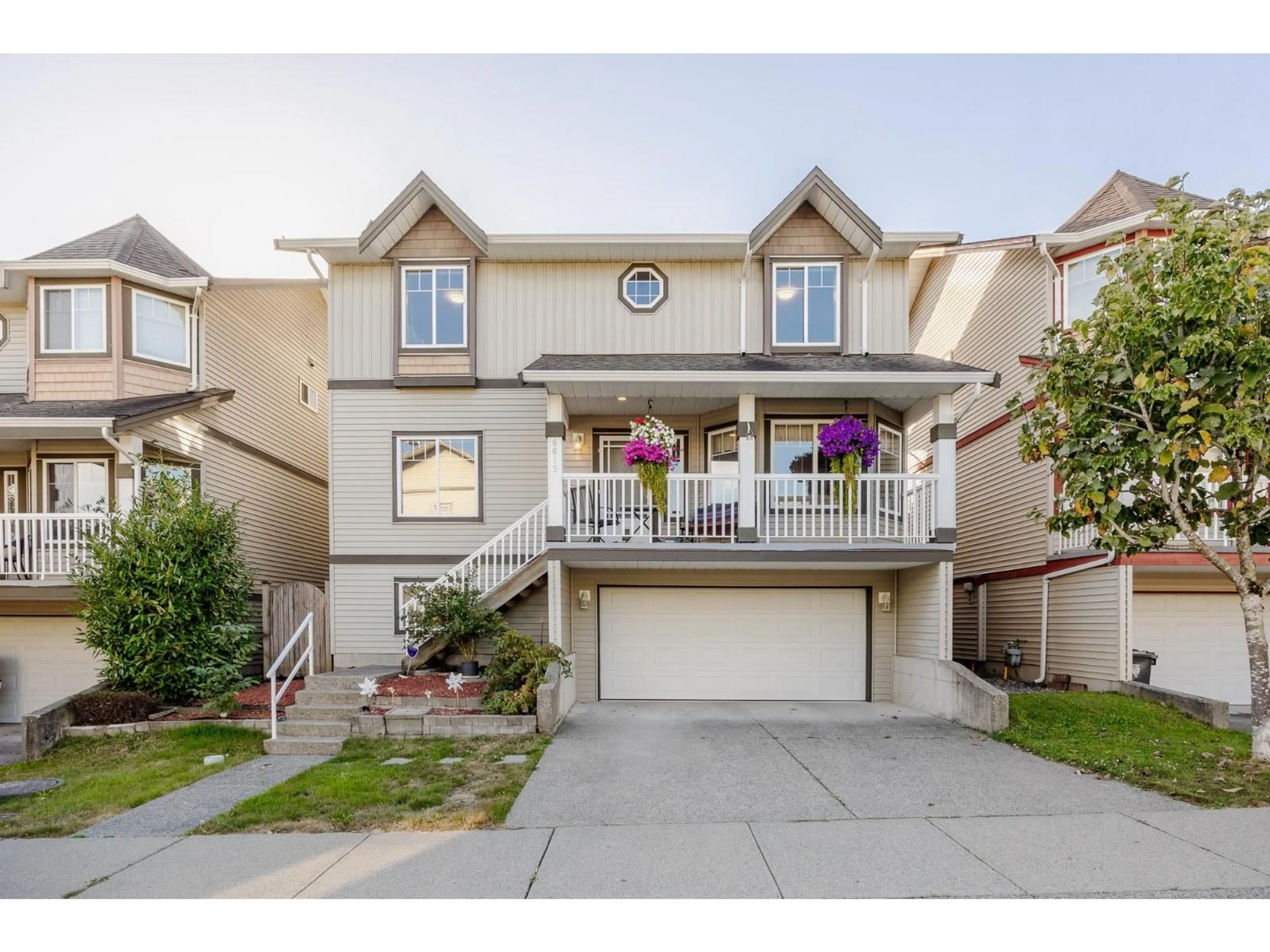 Home with vinyl exterior material, street for 6615 205, Langley British Columbia V1Y2X8