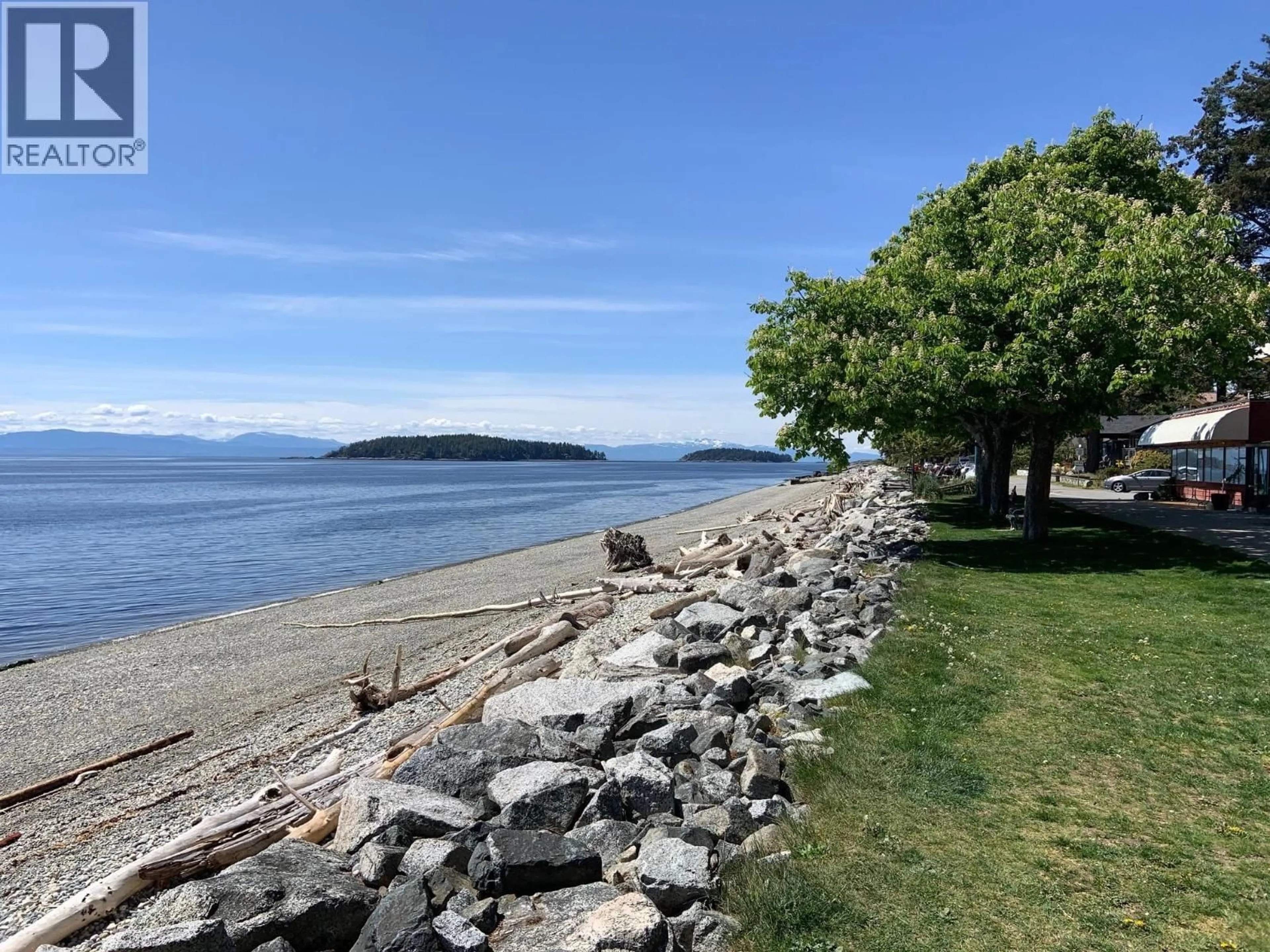 A pic from outside/outdoor area/front of a property/back of a property/a pic from drone, water/lake/river/ocean view for 405 - 5725 TEREDO STREET, Sechelt British Columbia V7Z0J7