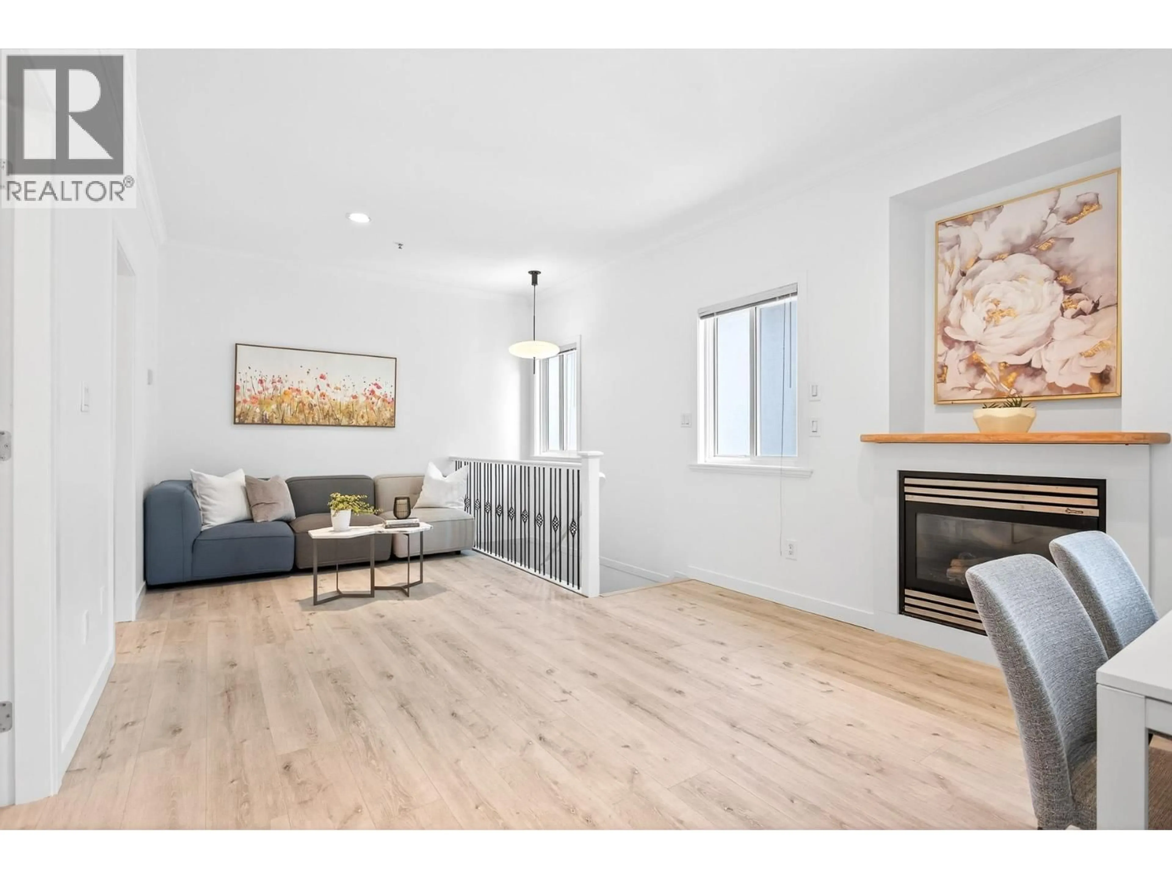 Living room with furniture, wood/laminate floor for 1368 7TH AVENUE, Vancouver British Columbia V5N1R7