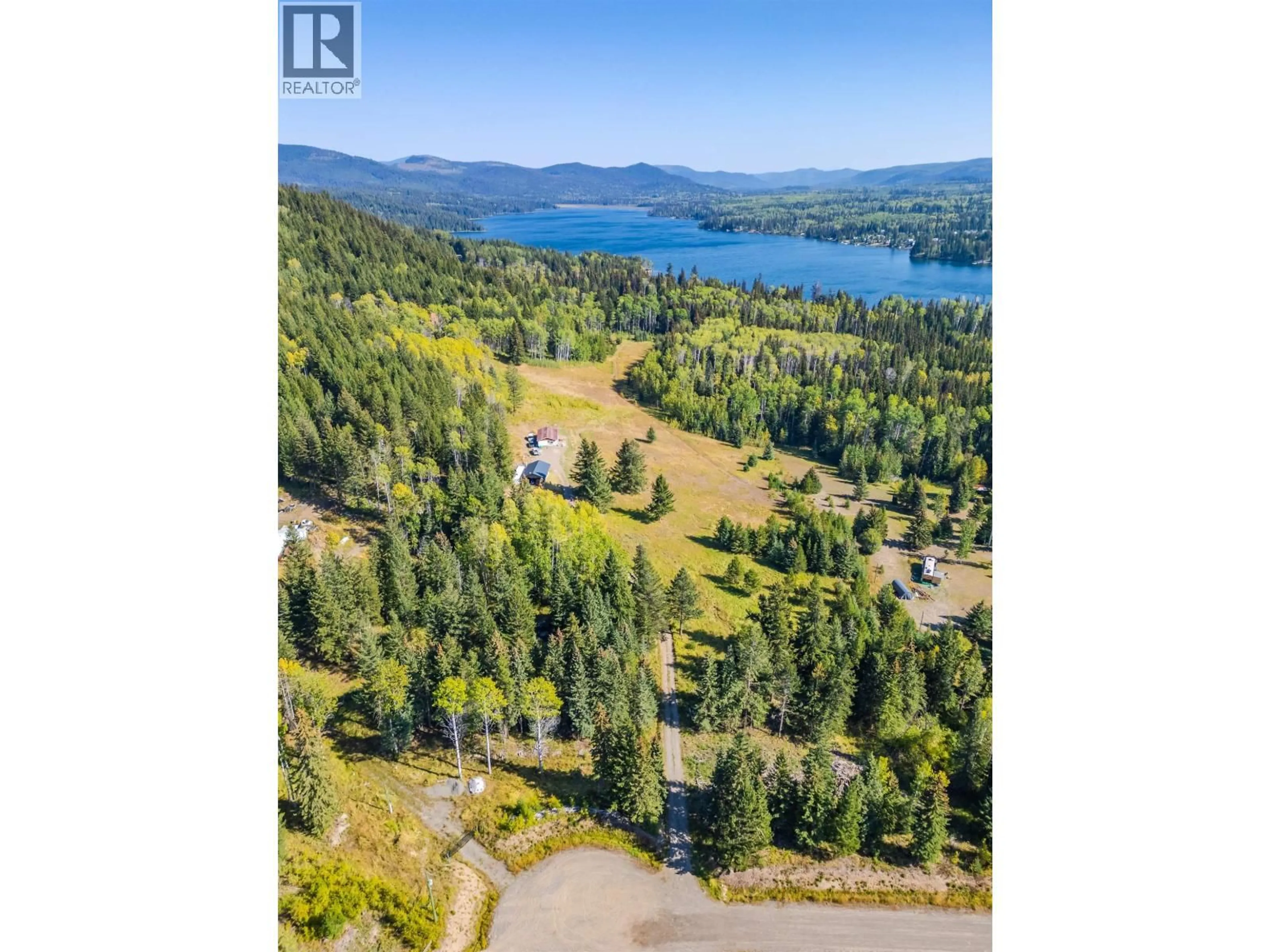 A pic from outside/outdoor area/front of a property/back of a property/a pic from drone, water/lake/river/ocean view for 6177 DEKA HEIGHTS ROAD, Deka Lake / Sulphurous / Hathaway Lakes British Columbia V0K1X3