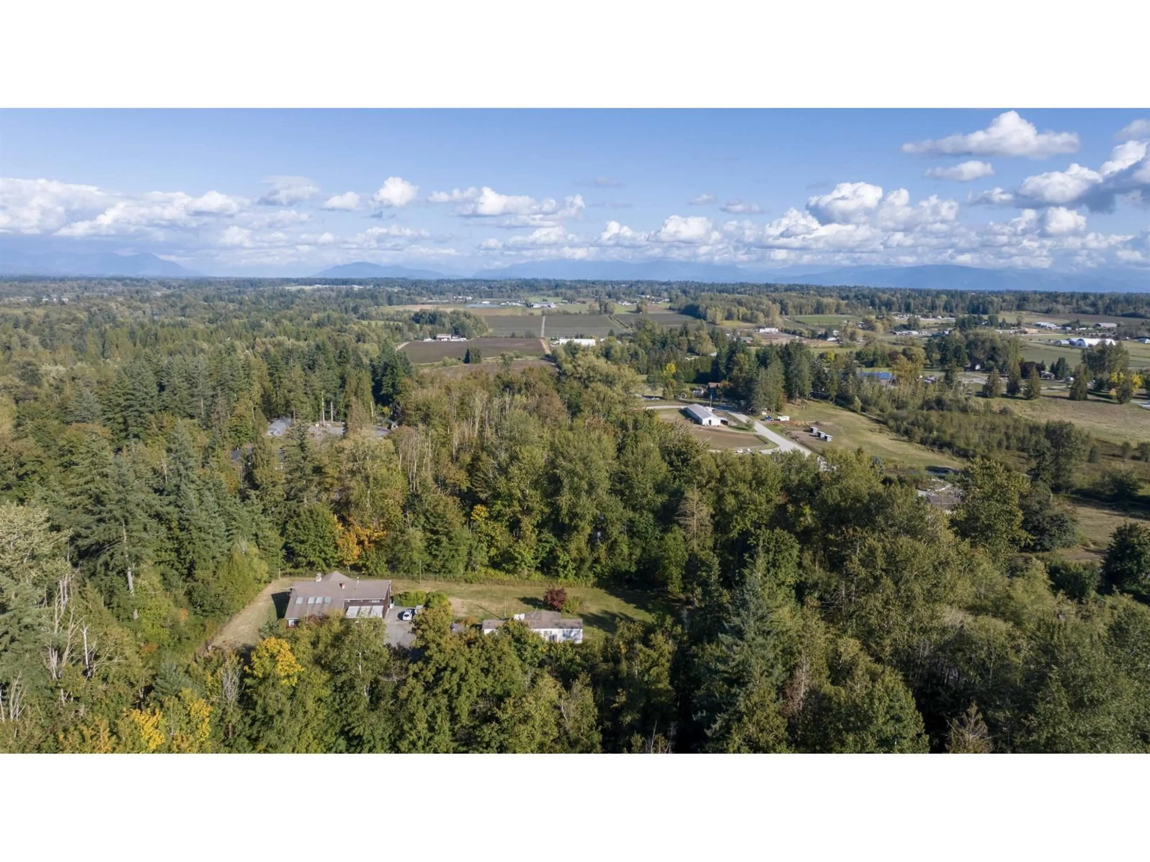 A pic from outside/outdoor area/front of a property/back of a property/a pic from drone, forest/trees view for 3308 210, Langley British Columbia V2Z2C4