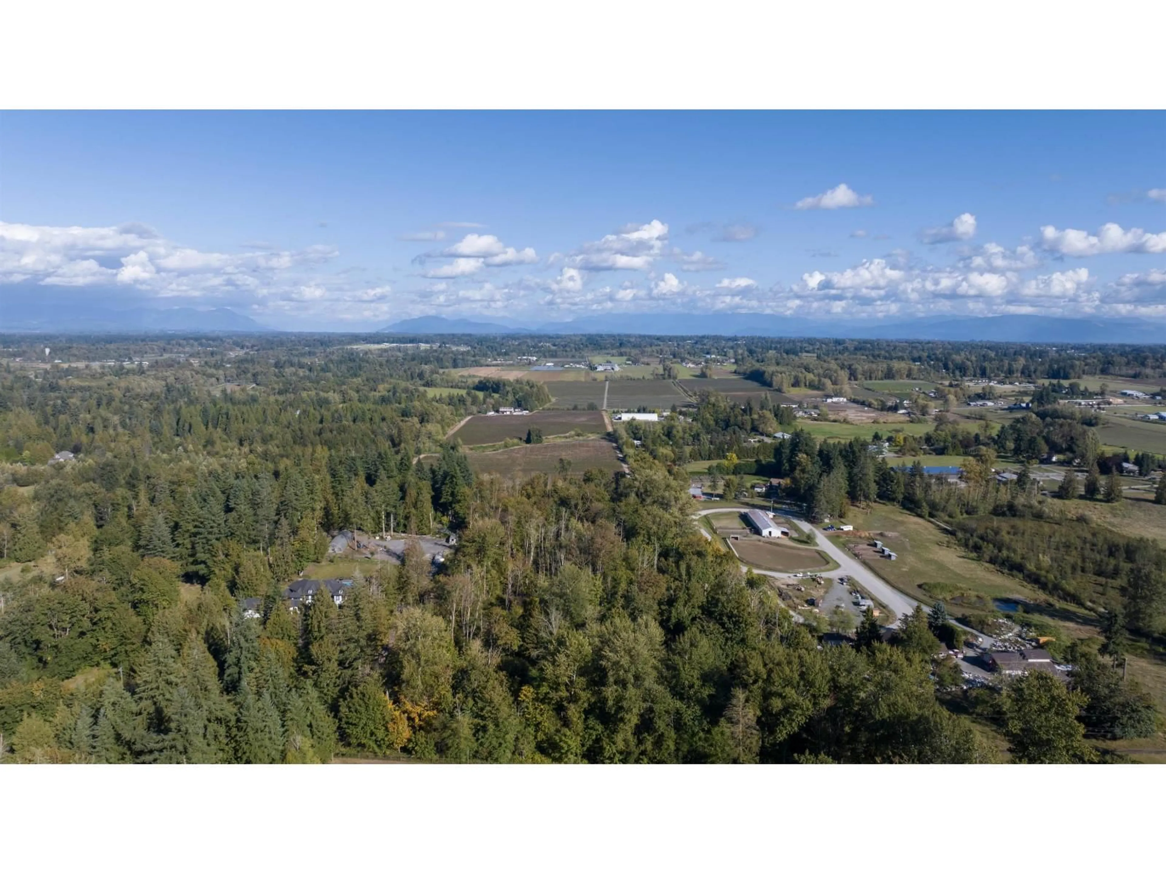 A pic from outside/outdoor area/front of a property/back of a property/a pic from drone, forest/trees view for 3308 210, Langley British Columbia V2Z2C4