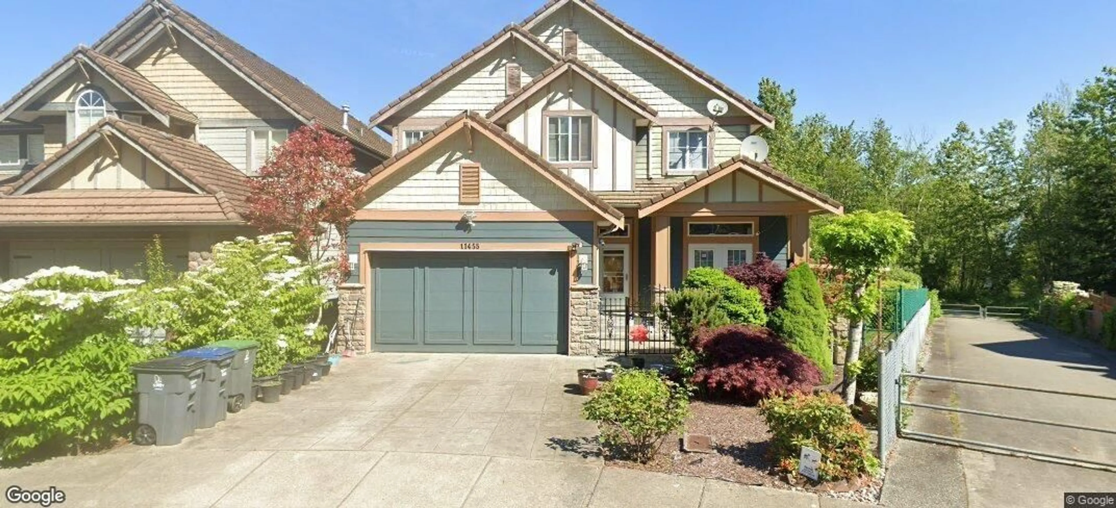 Home with vinyl exterior material, street for 11455 154A, Surrey British Columbia V3R2V7