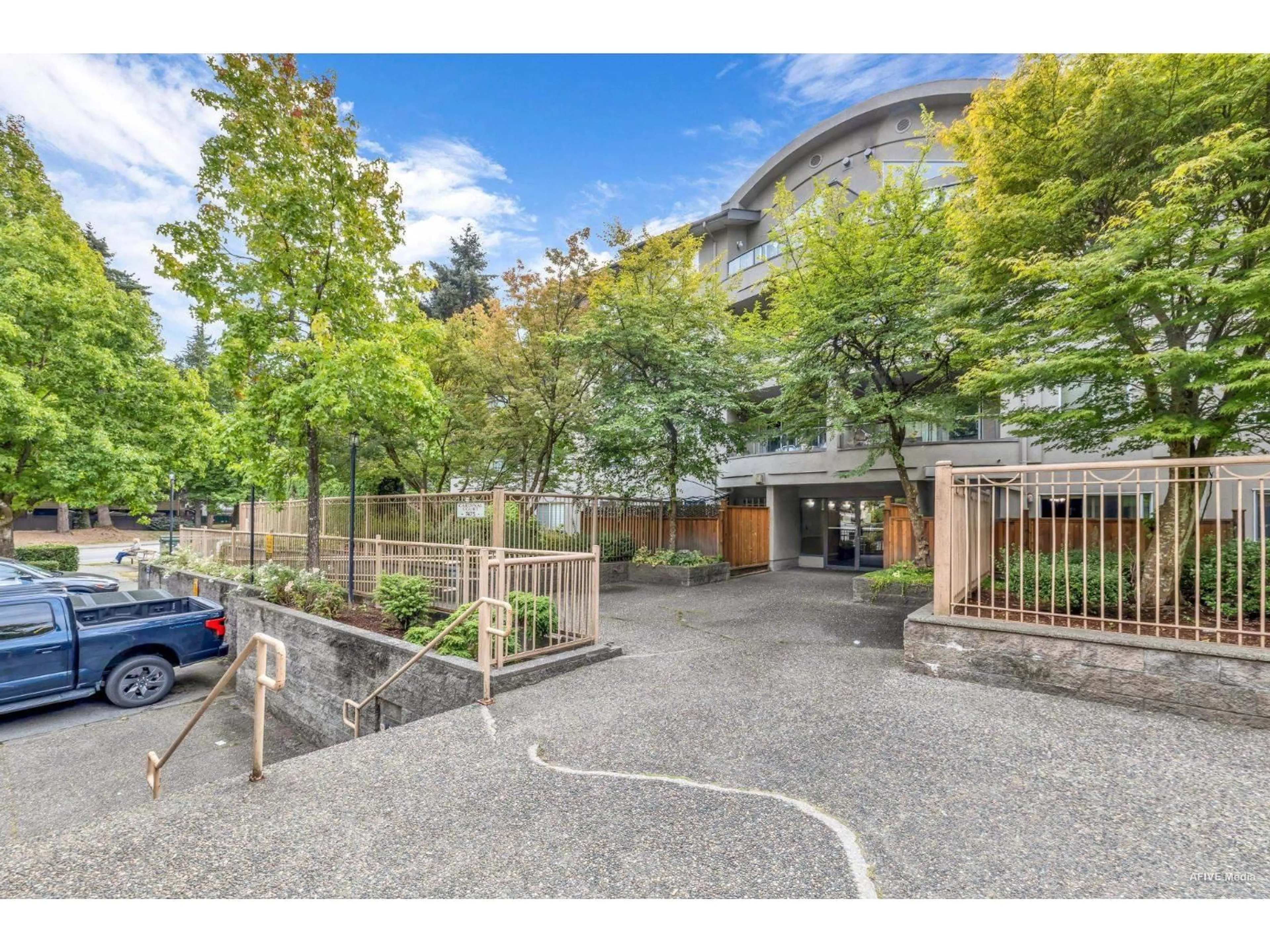 A pic from outside/outdoor area/front of a property/back of a property/a pic from drone, street for 103 - 7475 138, Surrey British Columbia V3W0Y9