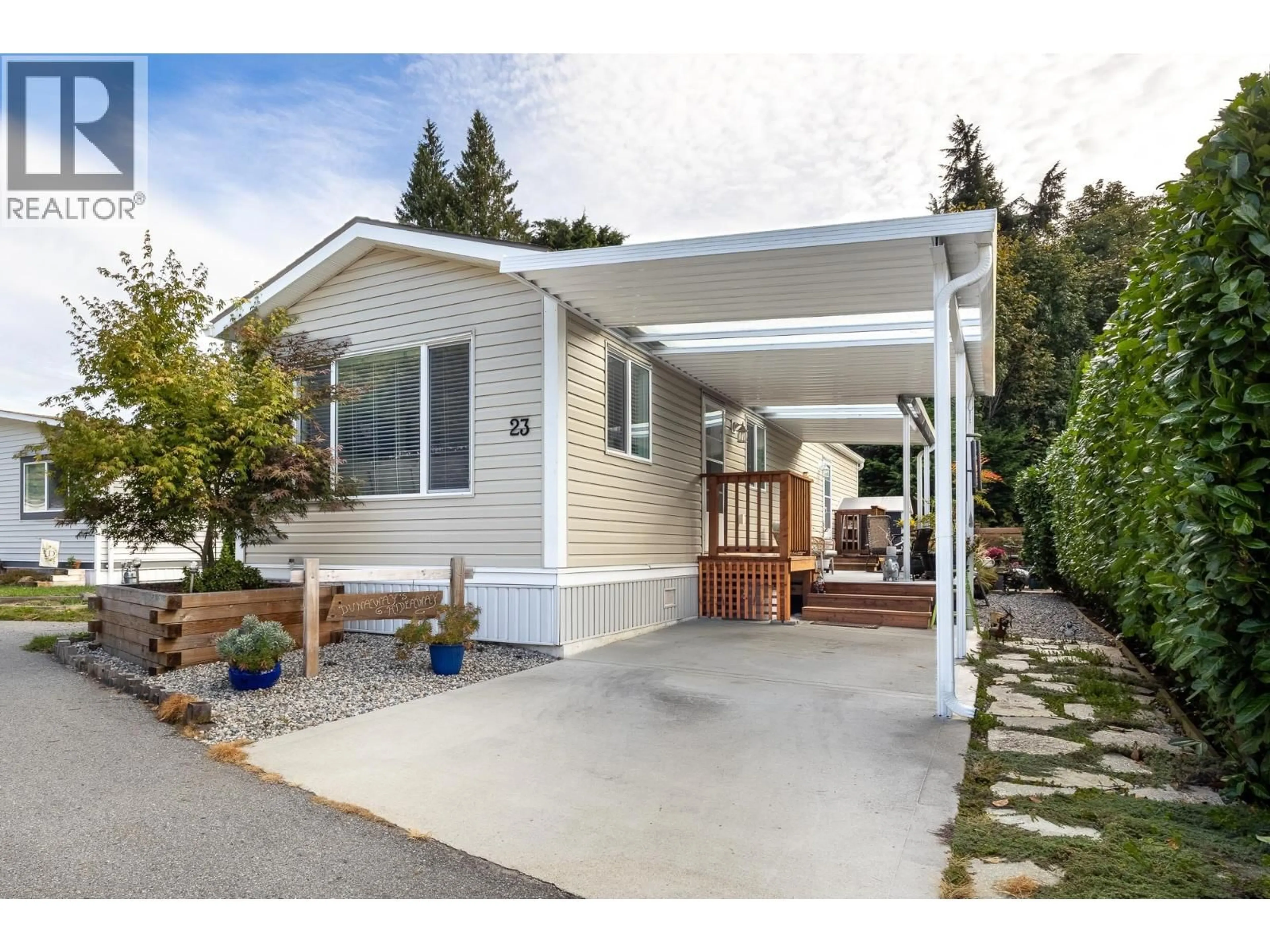 Home with vinyl exterior material, street for 23 - 4496 SUNSHINE COAST HIGHWAY, Sechelt British Columbia V7Z0C3