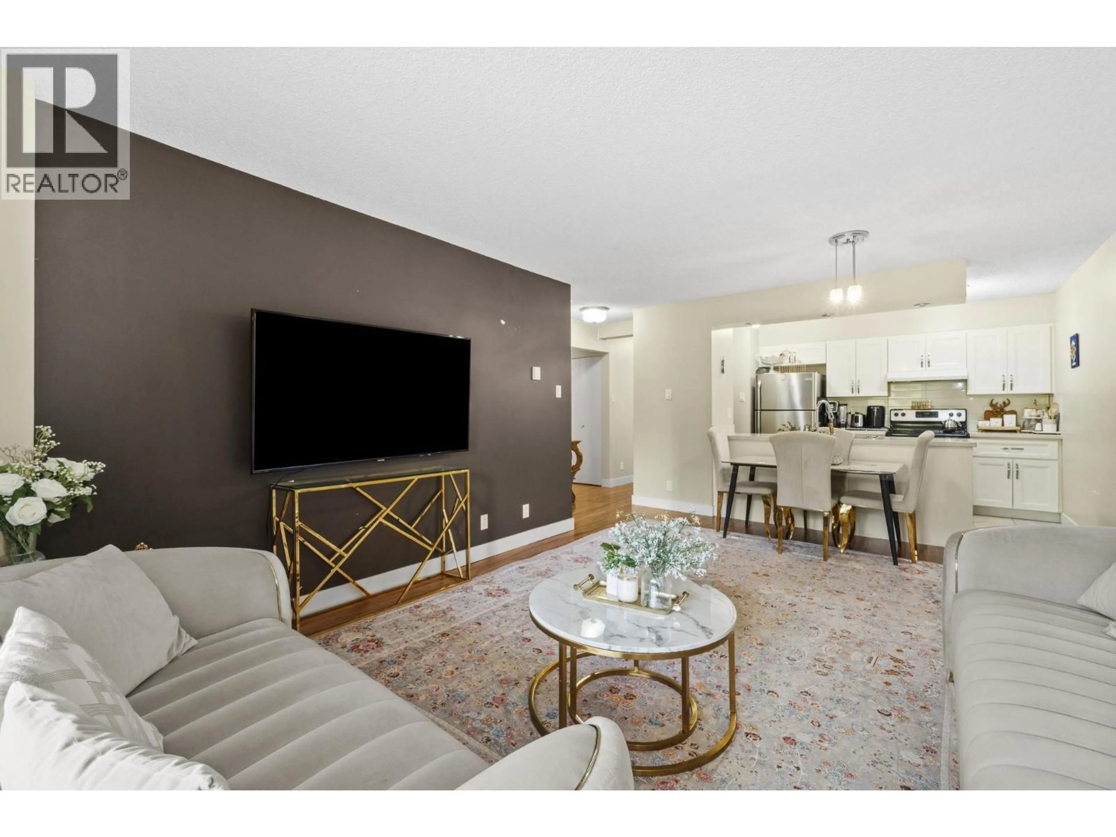 Living room with furniture, unknown for 401 - 9521 CARDSTON COURT, Burnaby British Columbia V3N4R8