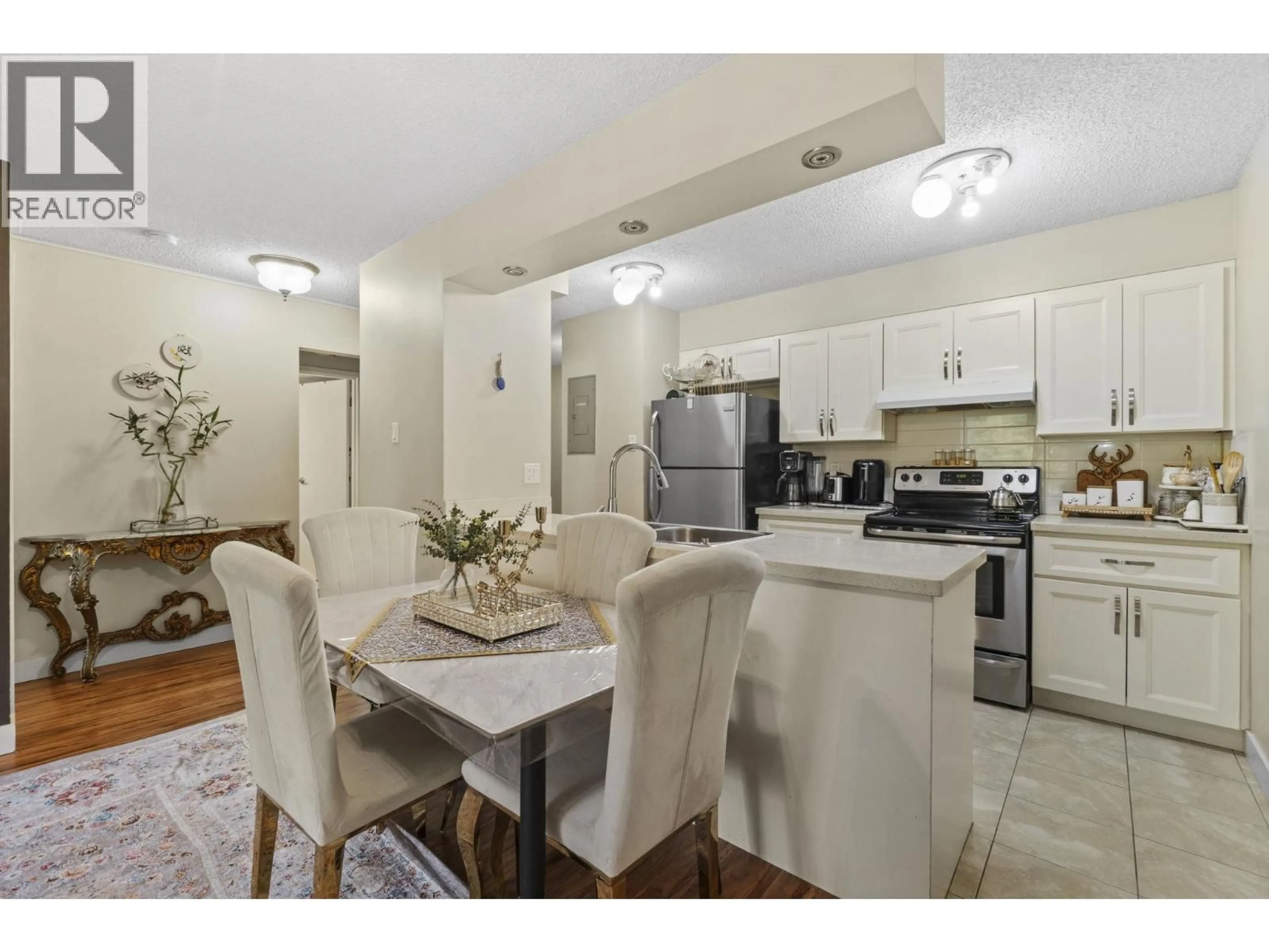 Open concept kitchen, unknown for 401 - 9521 CARDSTON COURT, Burnaby British Columbia V3N4R8