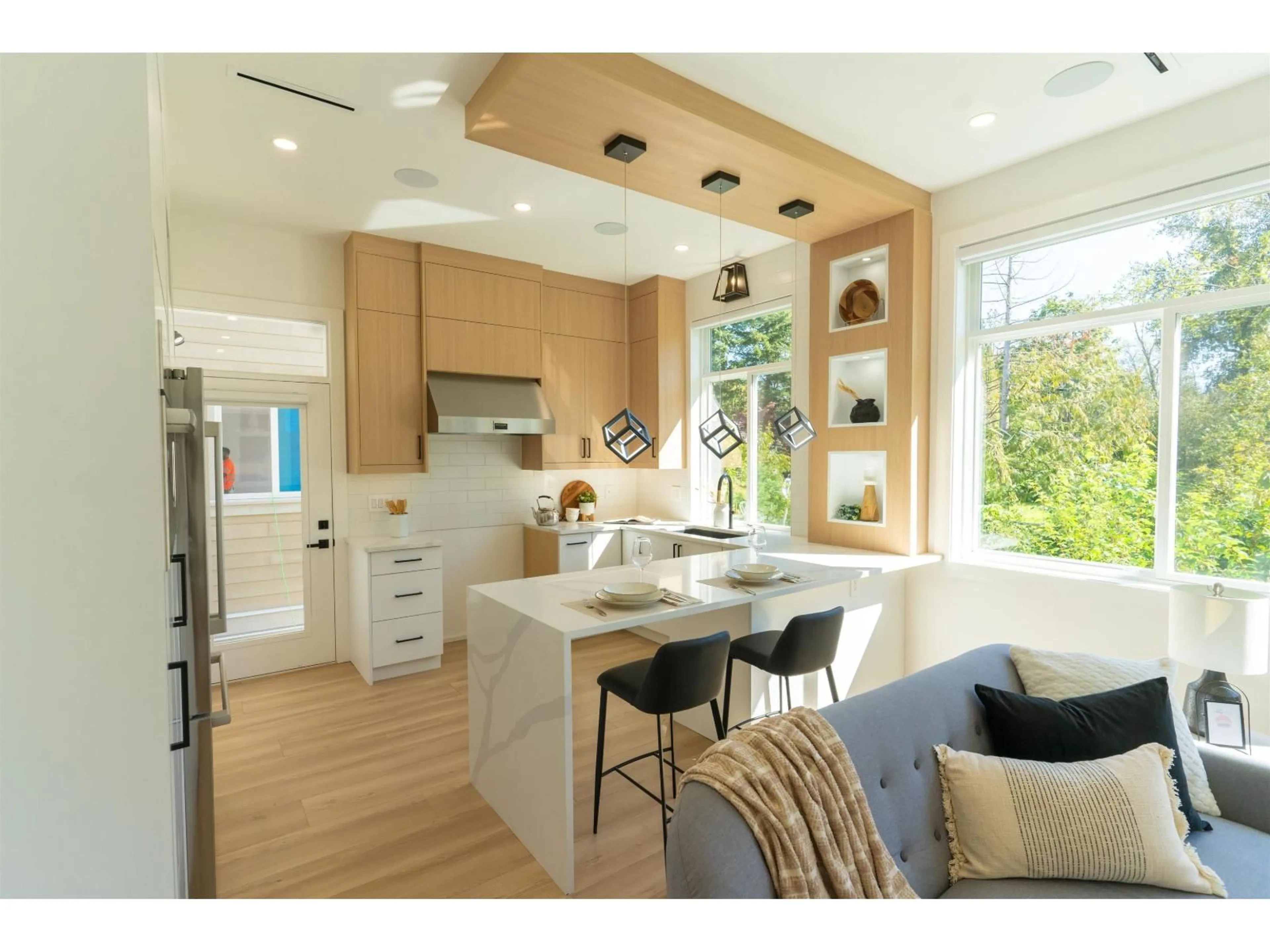 Open concept kitchen, wood/laminate floor for 7534 205A, Langley British Columbia V2Y1V5