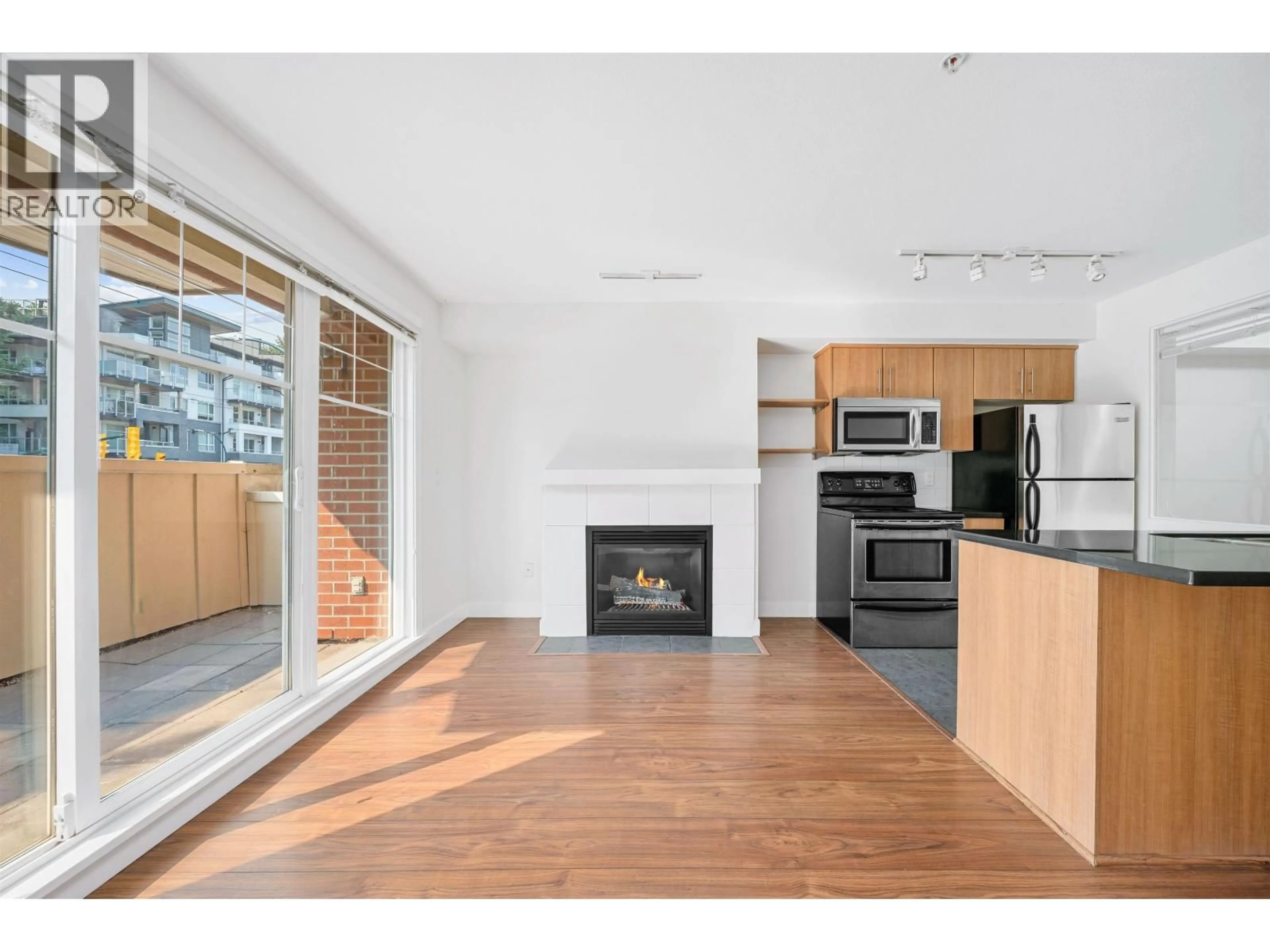Open concept kitchen, unknown for 203 - 3420 ST JOHNS STREET, Port Moody British Columbia V3H0C1
