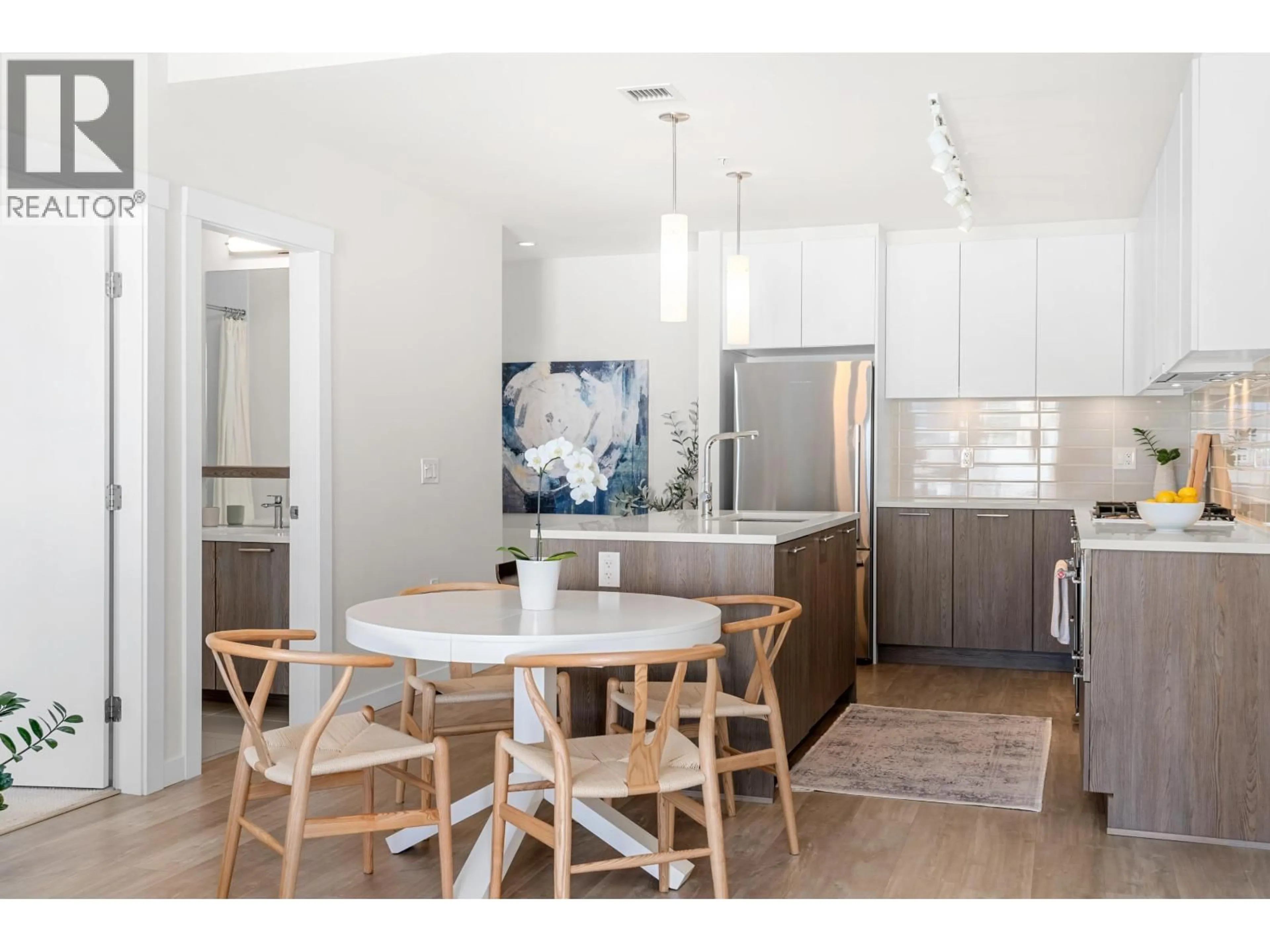 Open concept kitchen, unknown for 205 - 615 3RD STREET, North Vancouver British Columbia V7L0G3