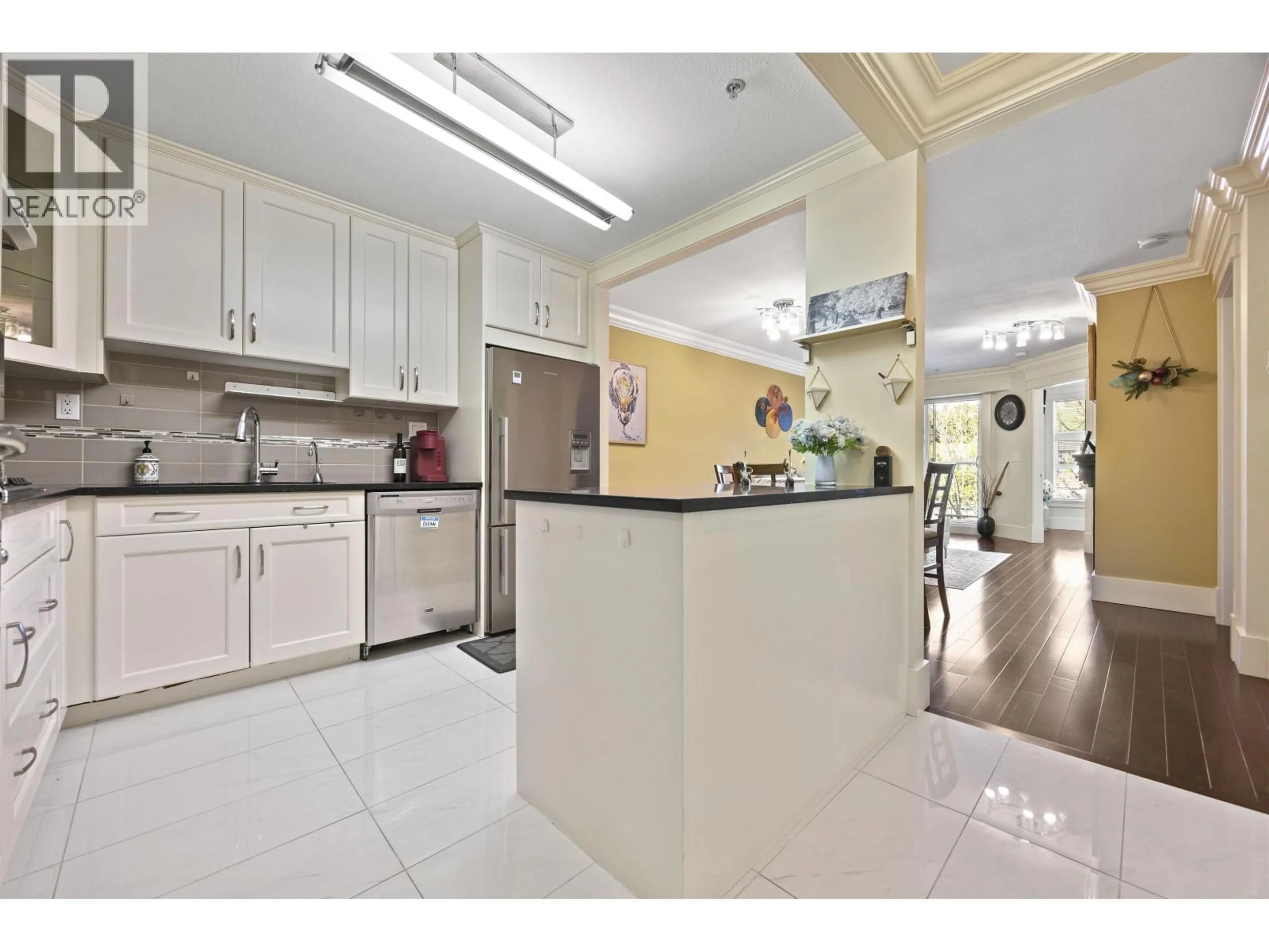 Open concept kitchen, ceramic/tile floor for 312 - 5723 COLLINGWOOD STREET, Vancouver British Columbia V6N4K6