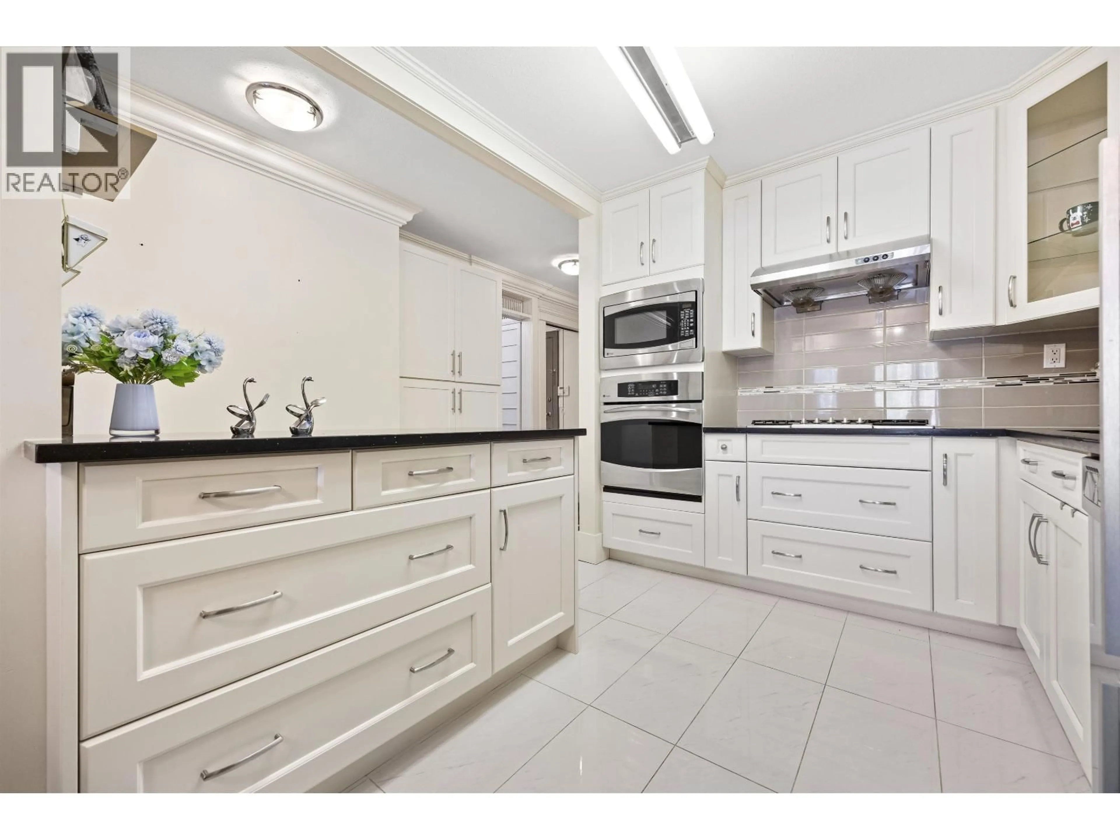 Standard kitchen, ceramic/tile floor for 312 - 5723 COLLINGWOOD STREET, Vancouver British Columbia V6N4K6