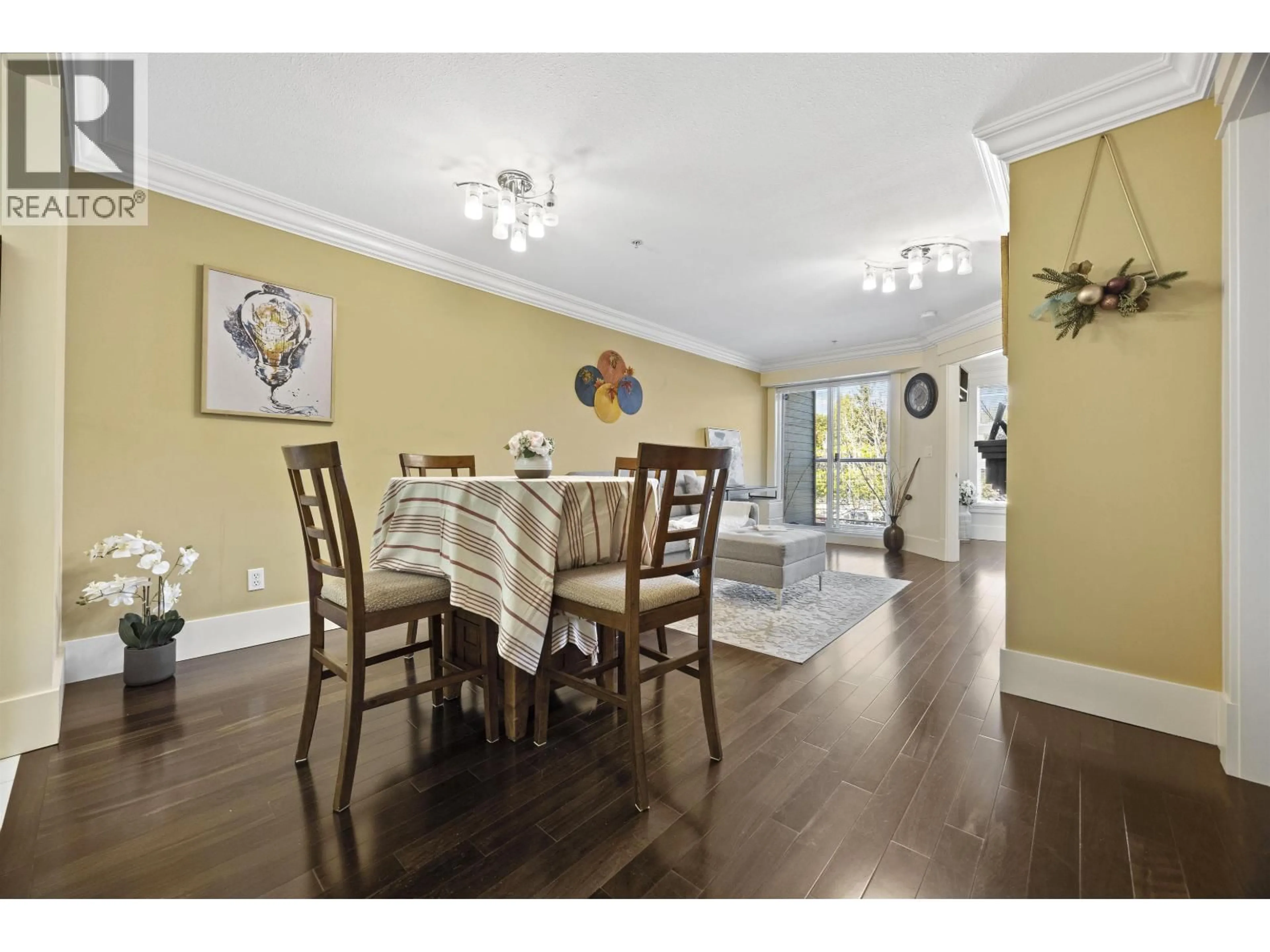 Dining room, wood/laminate floor for 312 - 5723 COLLINGWOOD STREET, Vancouver British Columbia V6N4K6