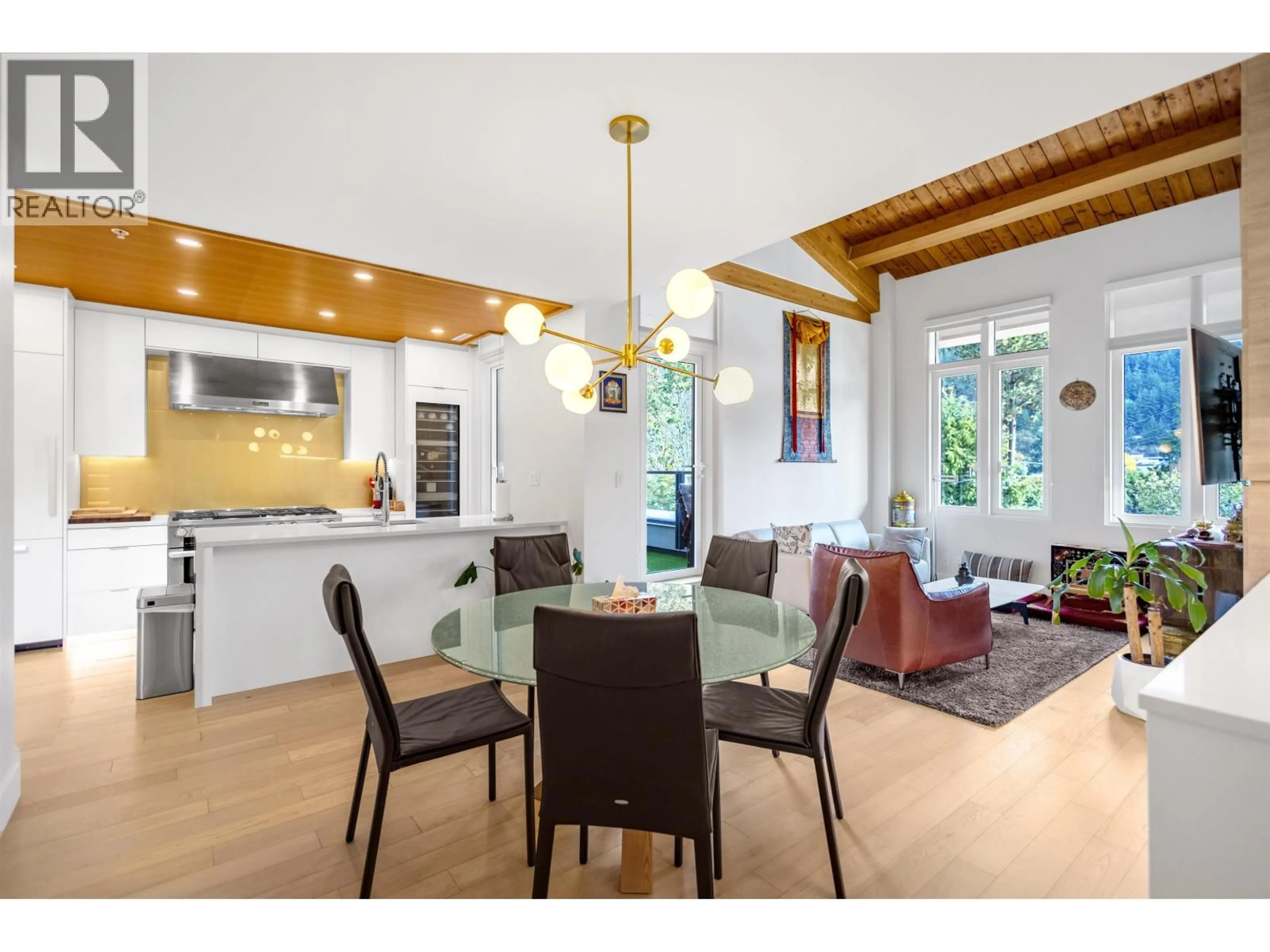 Open concept kitchen, wood/laminate floor for 301 - 6691 NELSON AVENUE, West Vancouver British Columbia V7W2B2