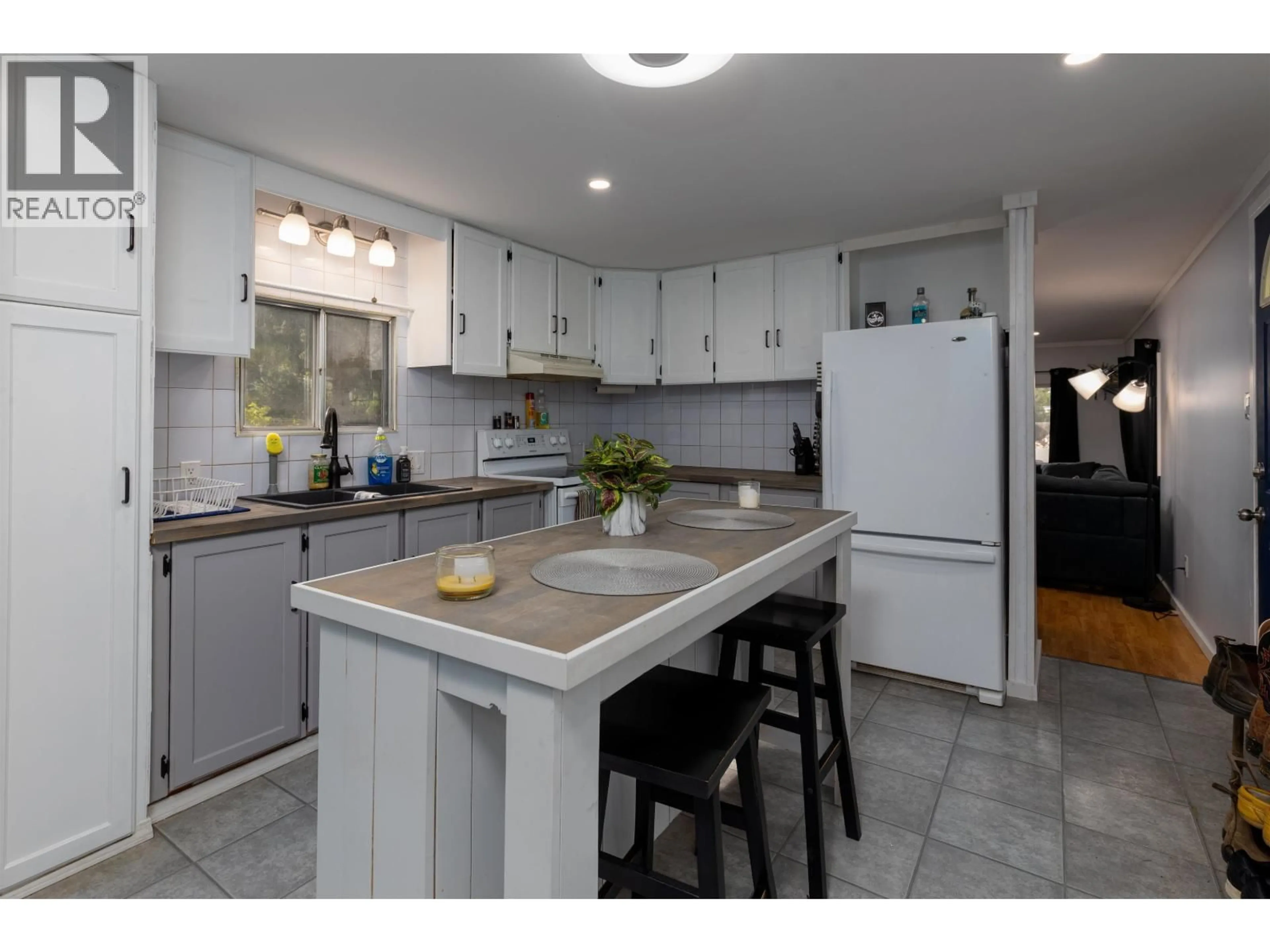 Open concept kitchen, ceramic/tile floor for 3934 KERBY STREET, Terrace British Columbia V8G4H7