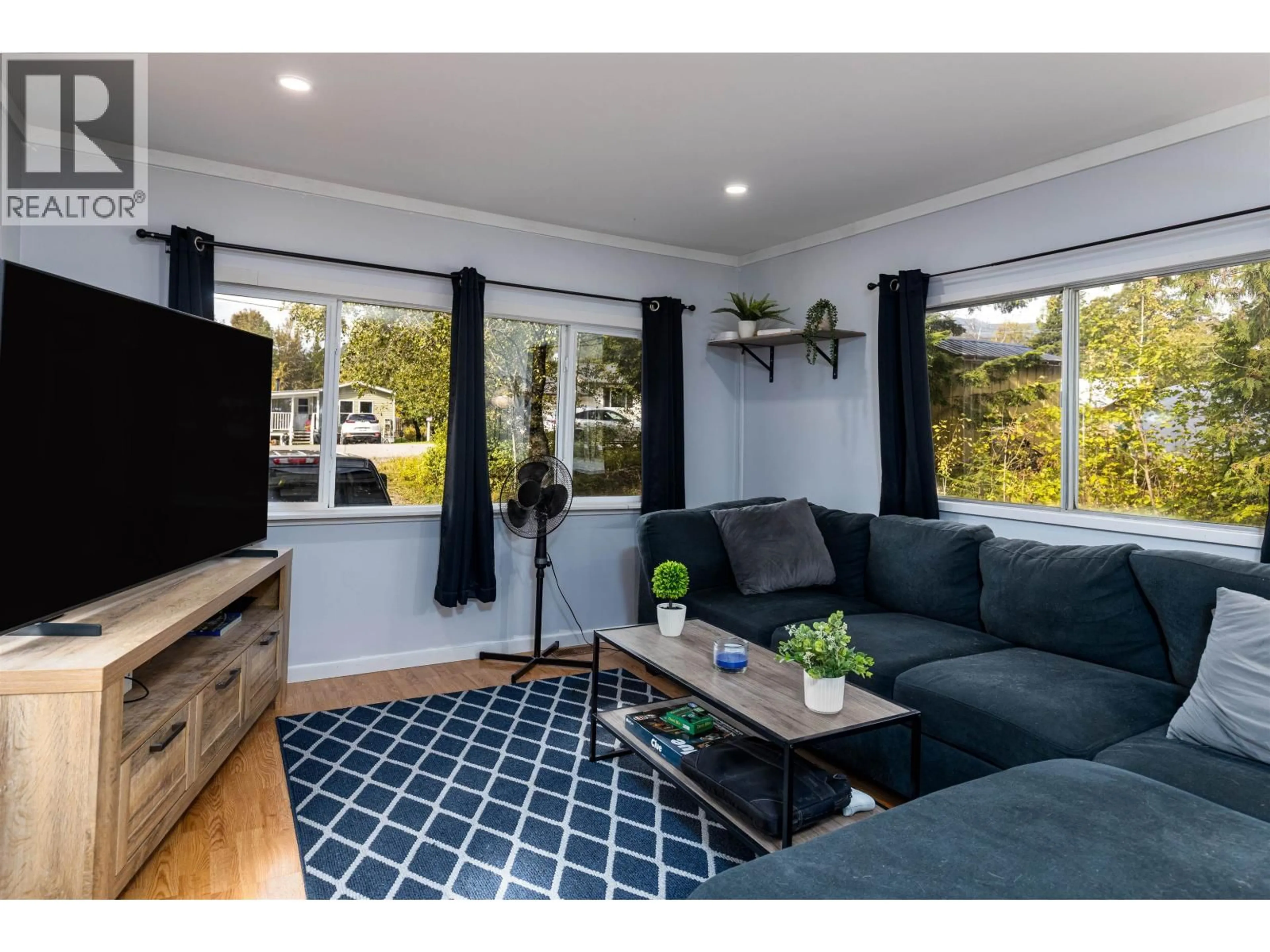 Living room with furniture, wood/laminate floor for 3934 KERBY STREET, Terrace British Columbia V8G4H7