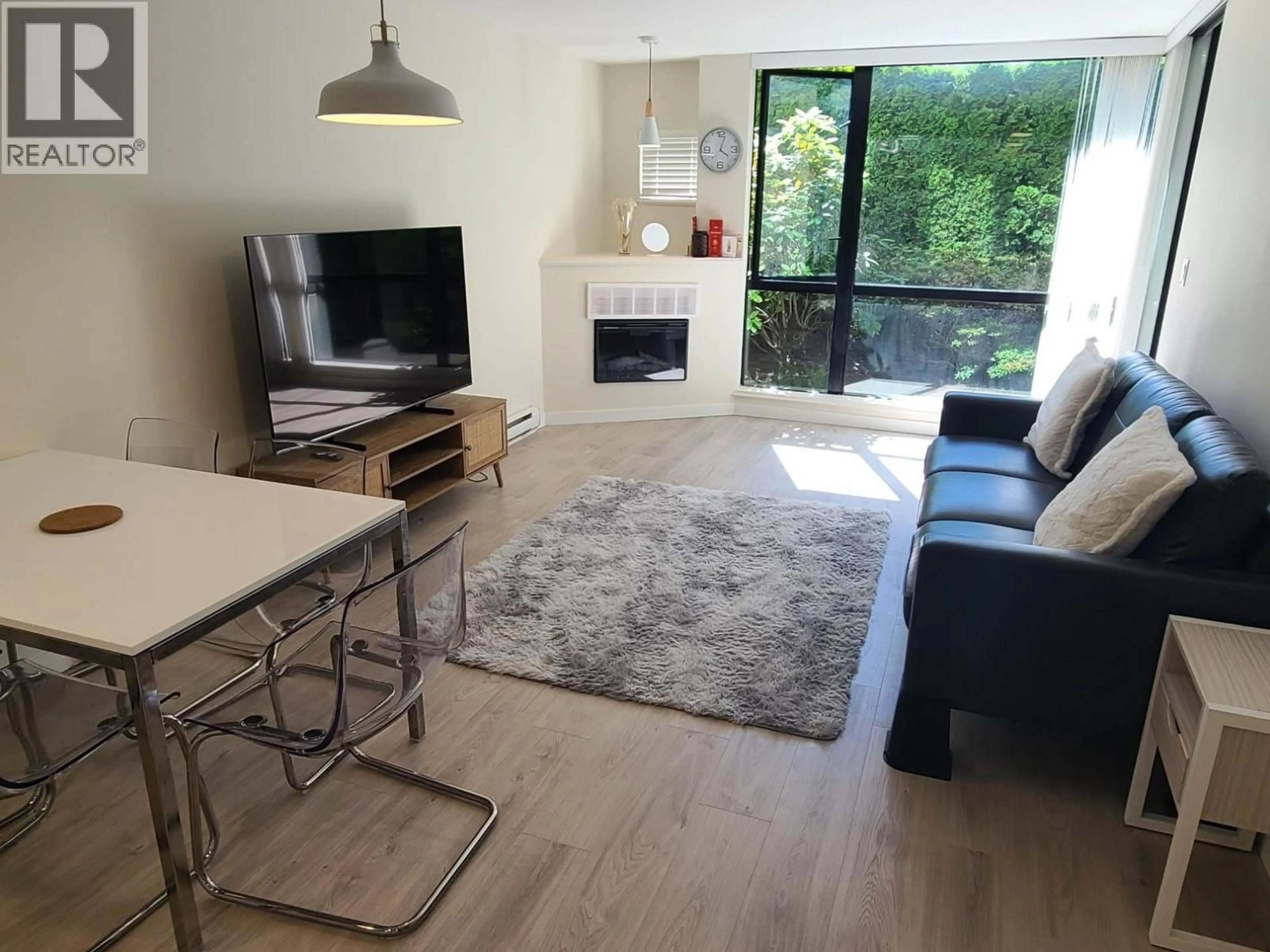 Living room with furniture, wood/laminate floor for 512 - 7831 WESTMINSTER HIGHWAY, Richmond British Columbia V6X1A4