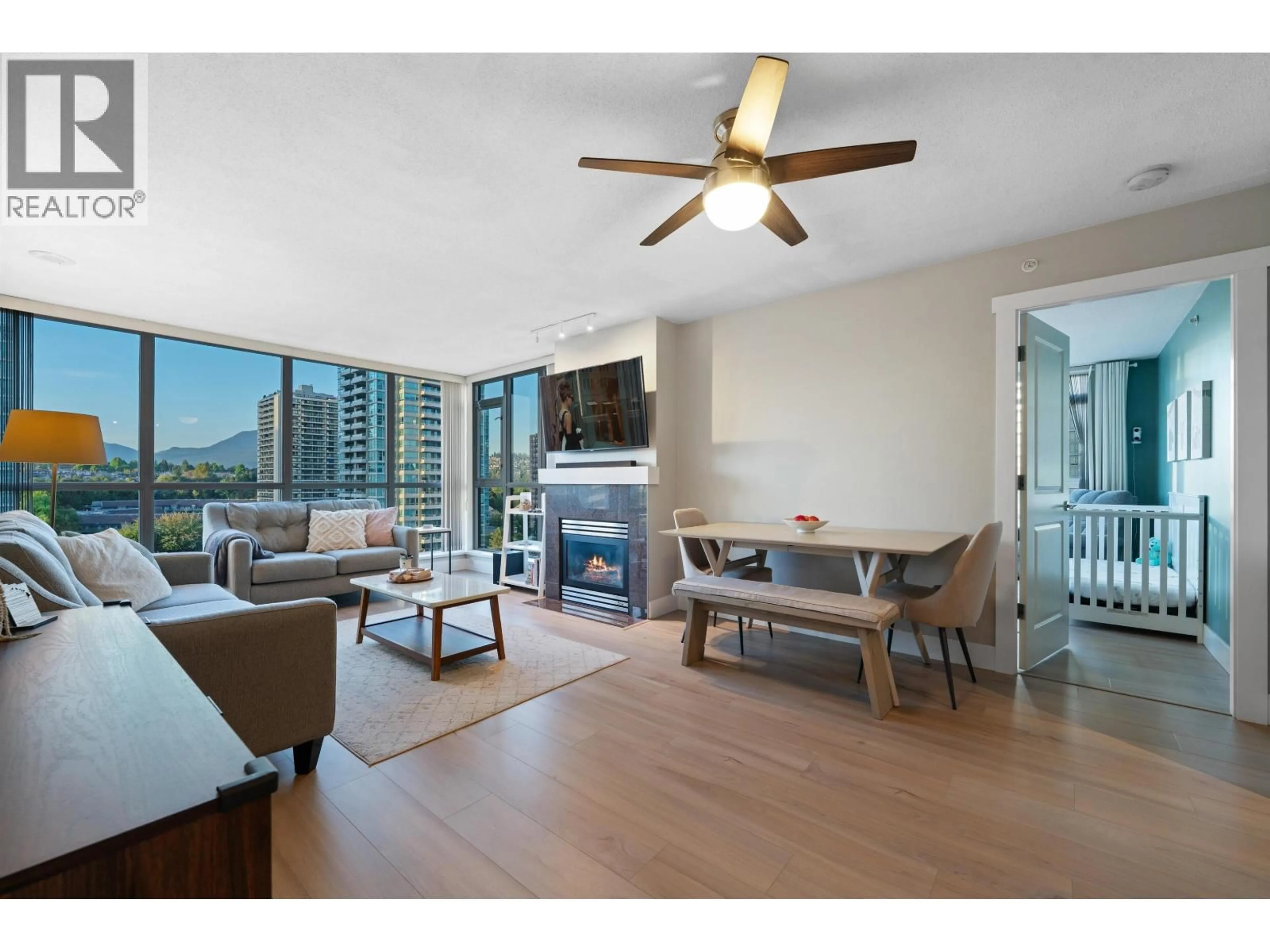 Living room with furniture, wood/laminate floor for 1606 - 2088 MADISON AVENUE, Burnaby British Columbia V5C6T5