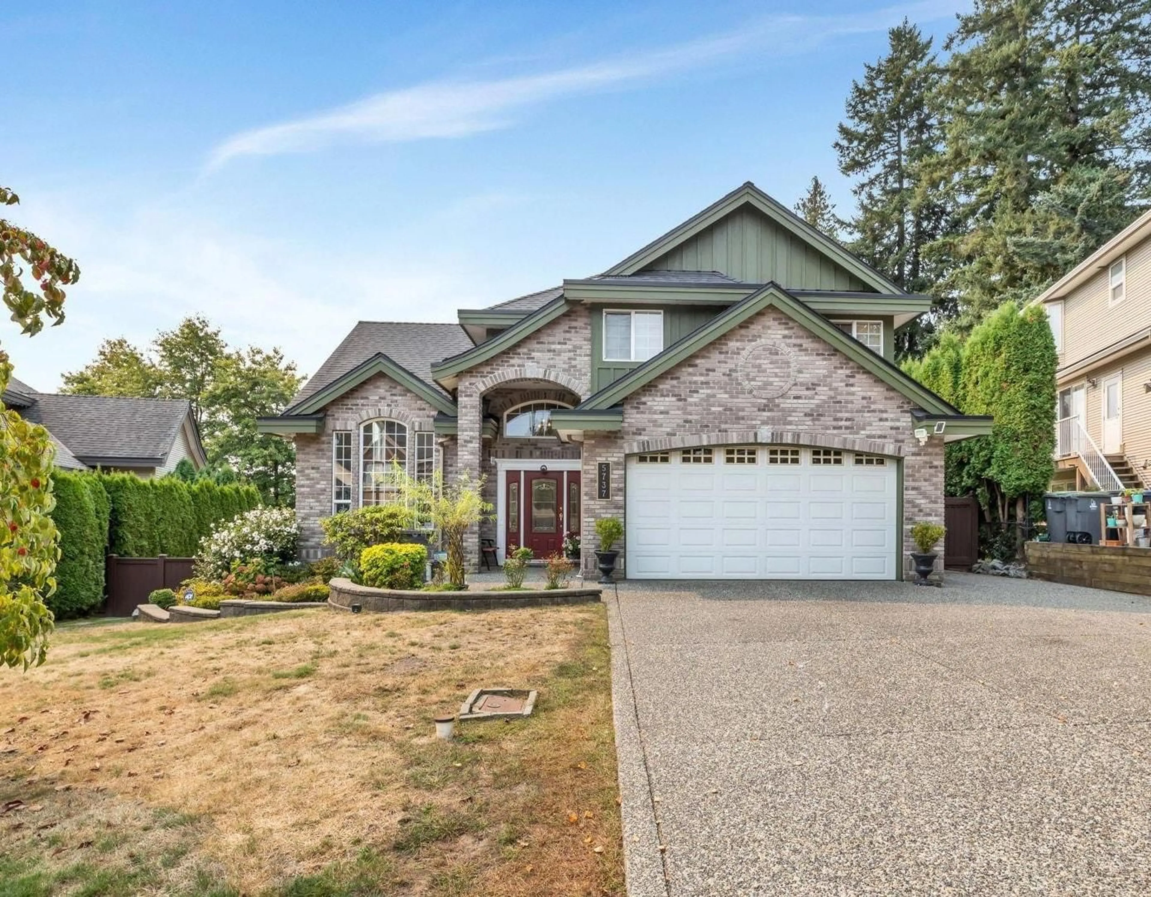 Home with vinyl exterior material, street for 5737 169A, Surrey British Columbia V3S8P3