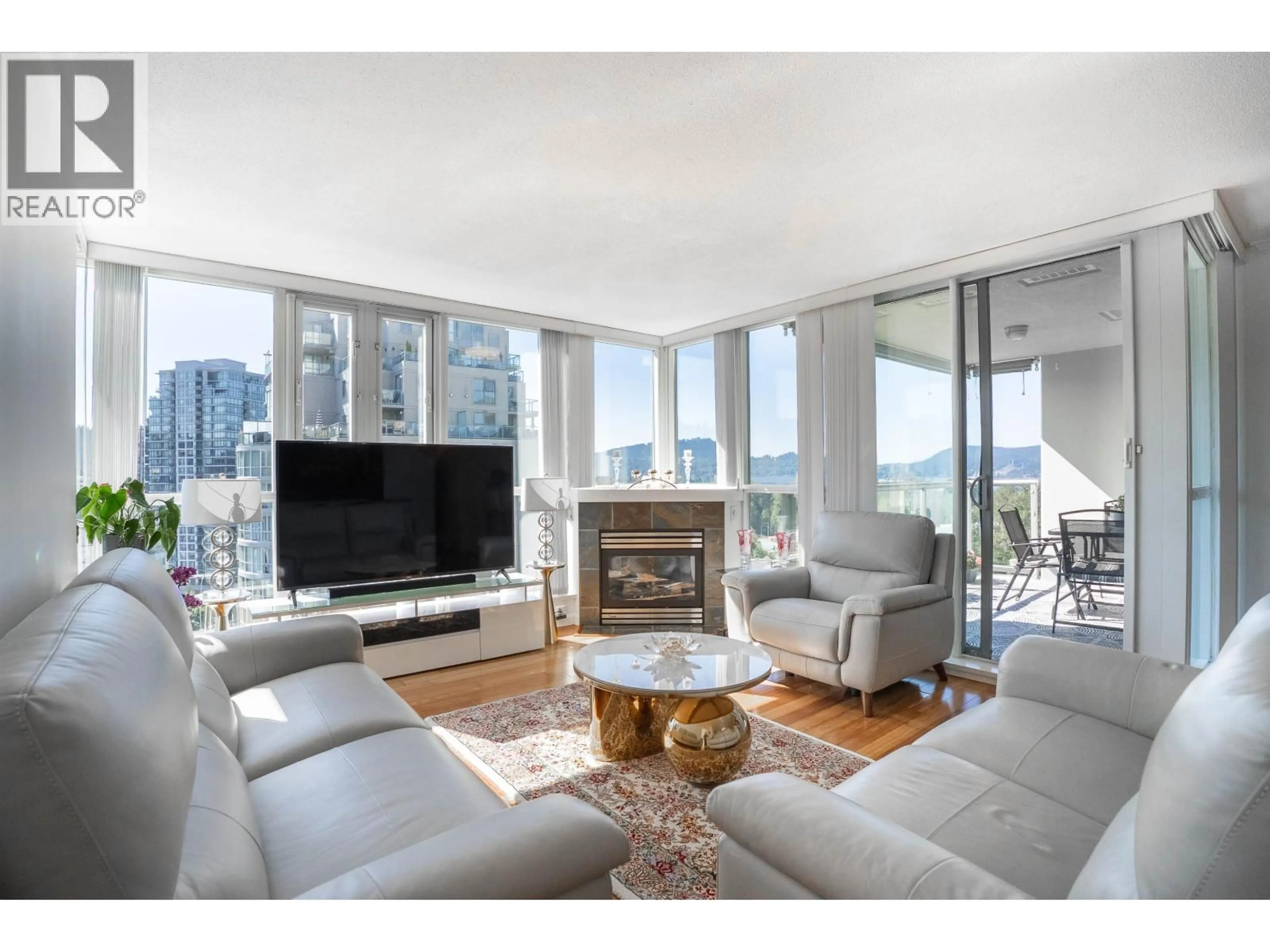 Living room with furniture, unknown for 1403 - 235 GUILDFORD WAY, Port Moody British Columbia V3H5L8