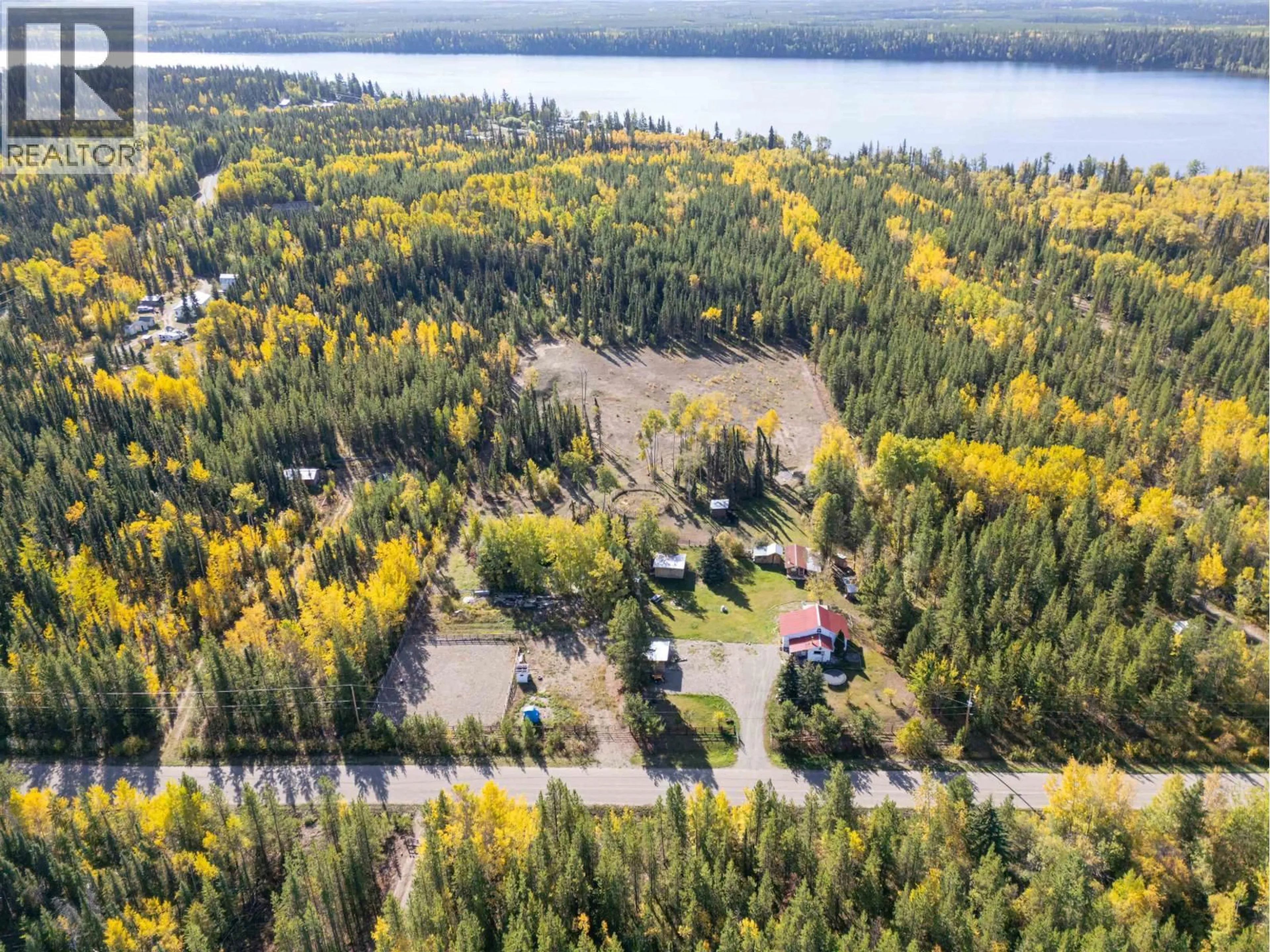 A pic from outside/outdoor area/front of a property/back of a property/a pic from drone, water/lake/river/ocean view for 54175 SUTTON ROAD, Vanderhoof British Columbia V0J3A0