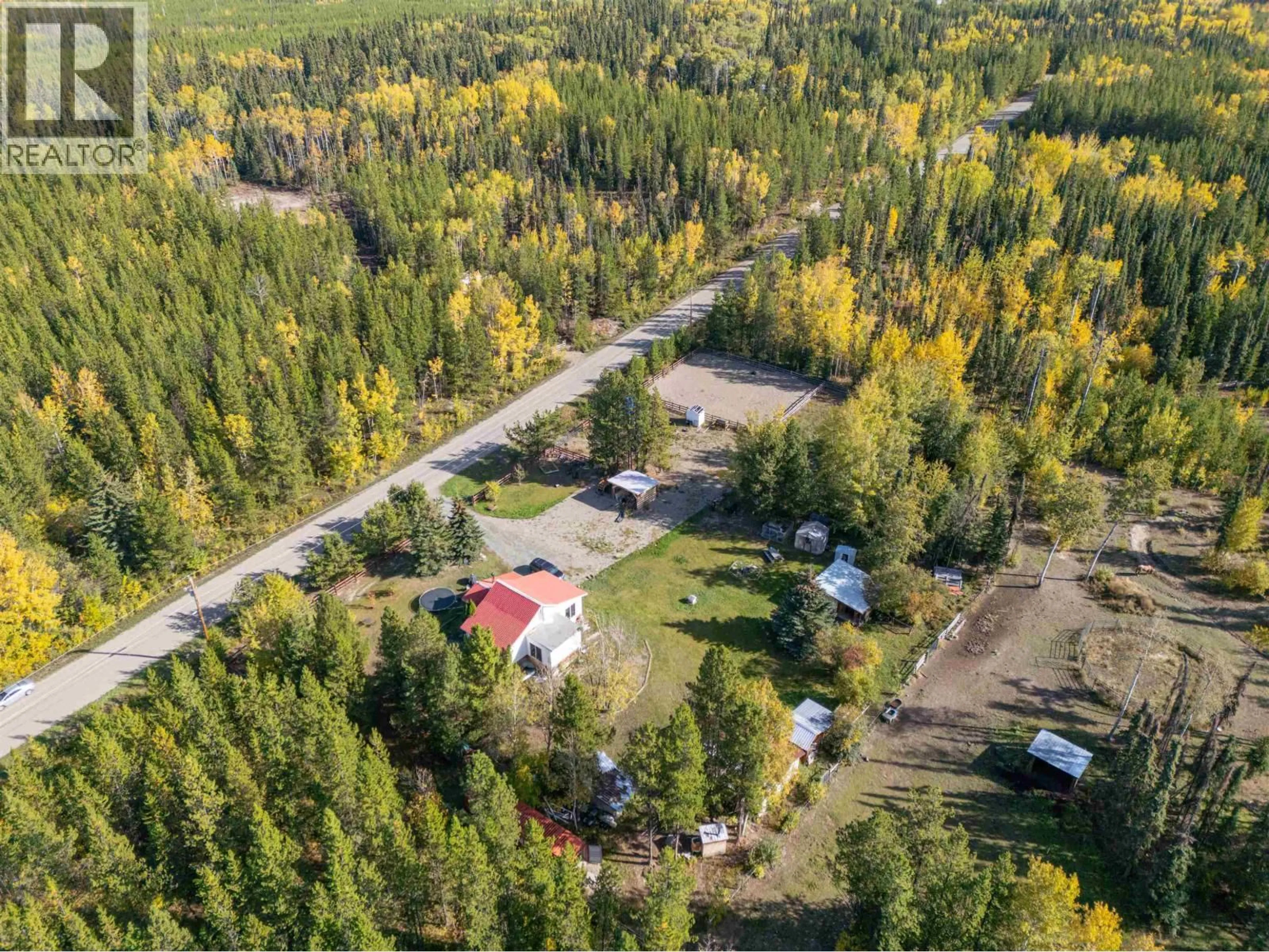 A pic from outside/outdoor area/front of a property/back of a property/a pic from drone, forest/trees view for 54175 SUTTON ROAD, Vanderhoof British Columbia V0J3A0