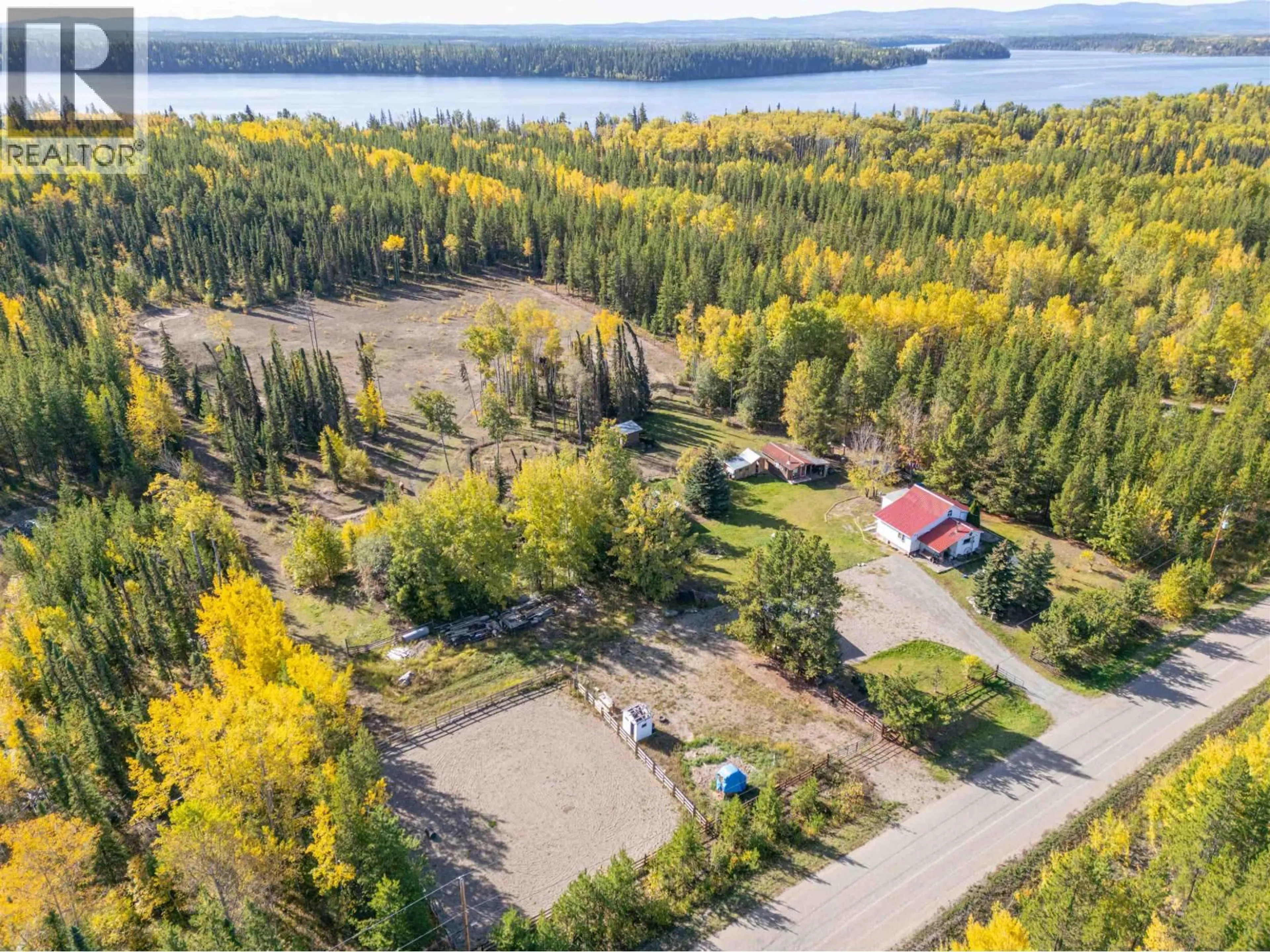 A pic from outside/outdoor area/front of a property/back of a property/a pic from drone, water/lake/river/ocean view for 54175 SUTTON ROAD, Vanderhoof British Columbia V0J3A0