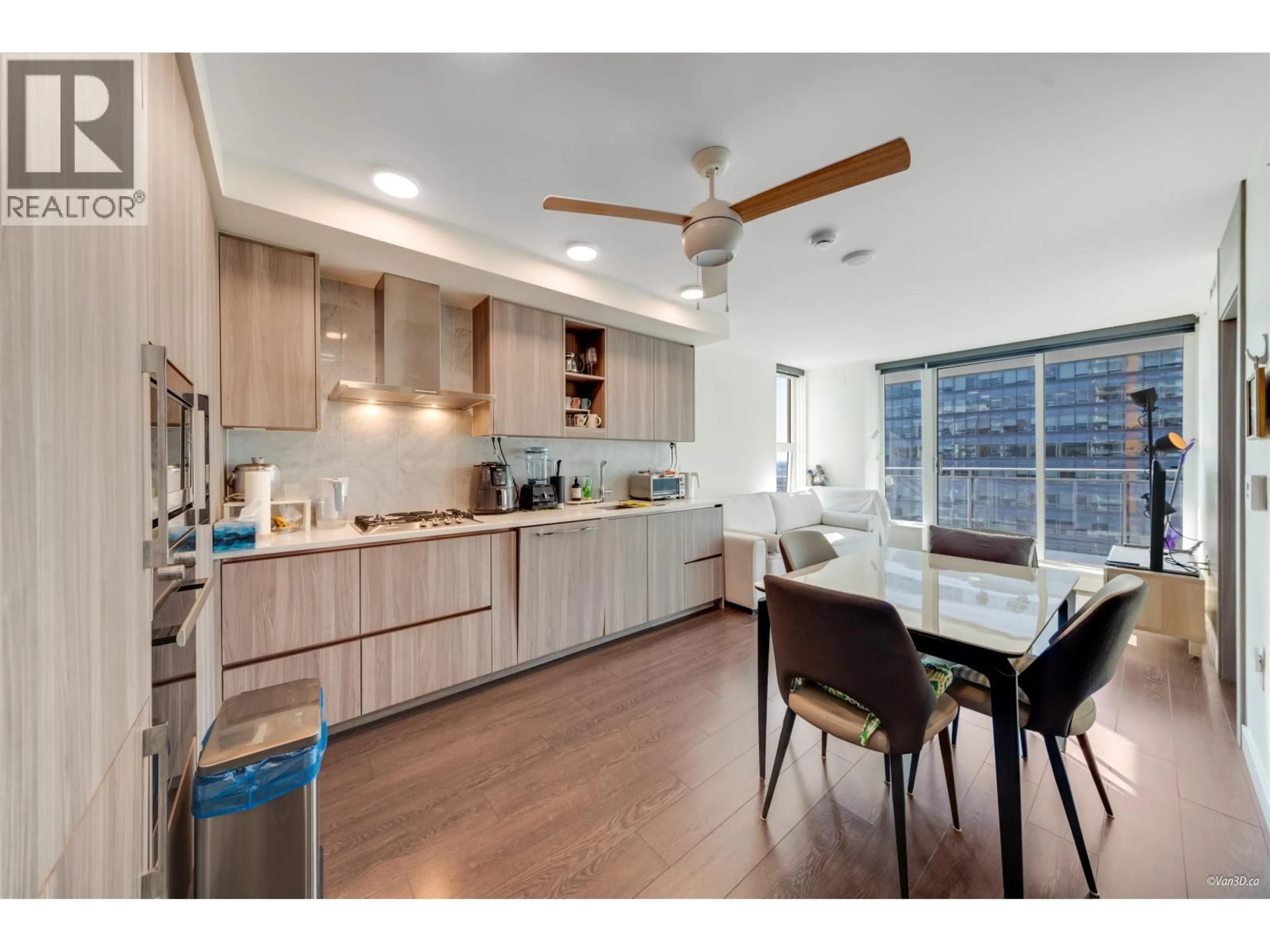 Open concept kitchen, wood/laminate floor for 1902 - 455 MARINE DRIVE, Vancouver British Columbia V5X0H3