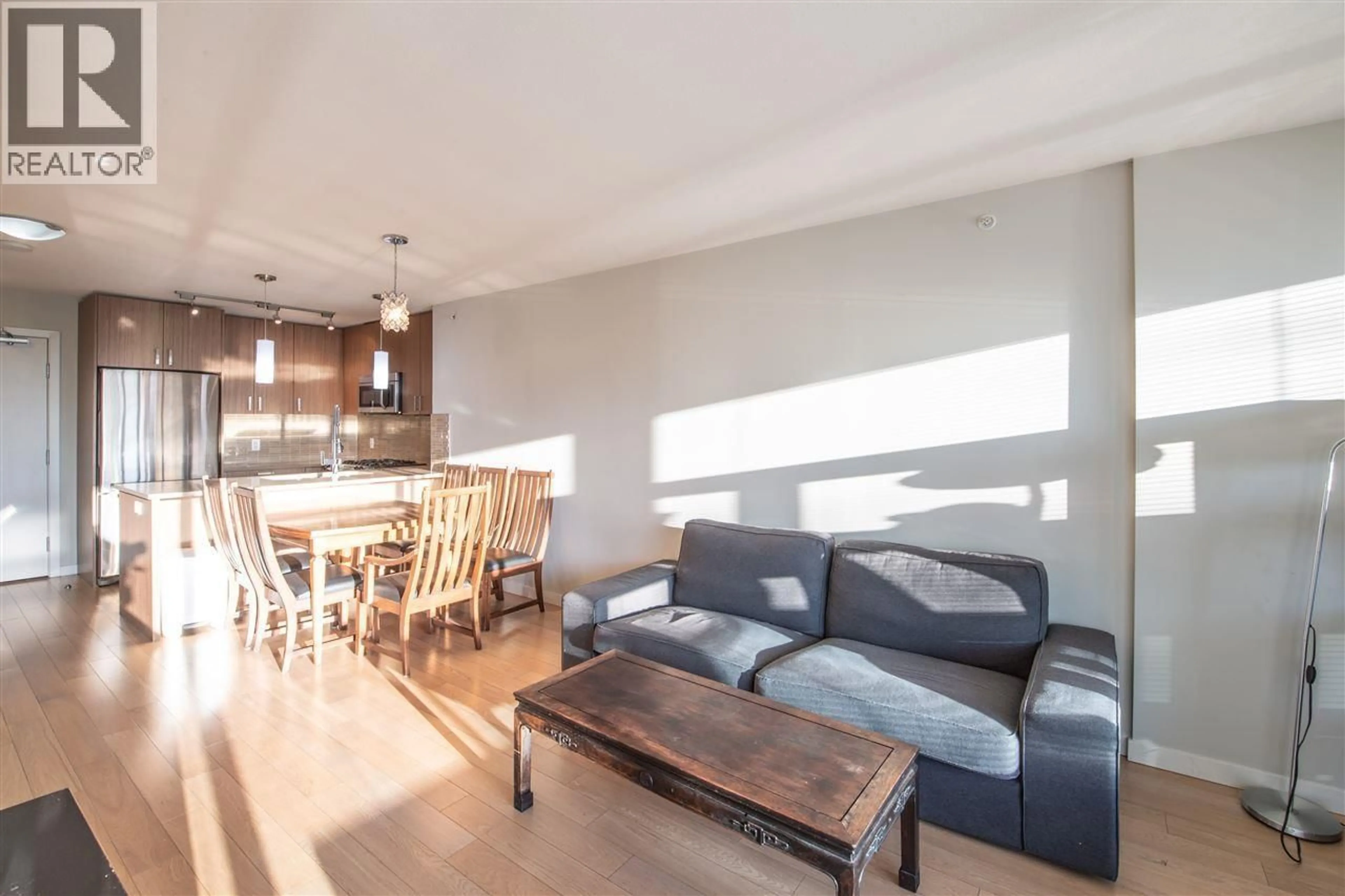 Living room with furniture, wood/laminate floor for 308 - 7117 ELMBRIDGE WAY, Richmond British Columbia V6X0J2