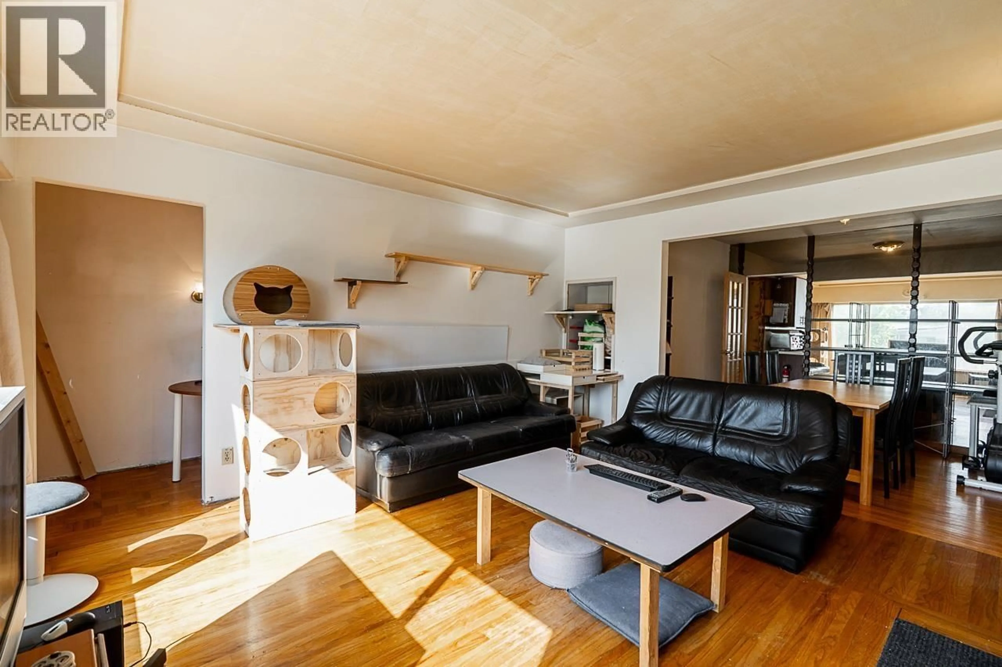 Living room with furniture, wood/laminate floor for 2781 54TH AVENUE, Vancouver British Columbia V5S1Y1