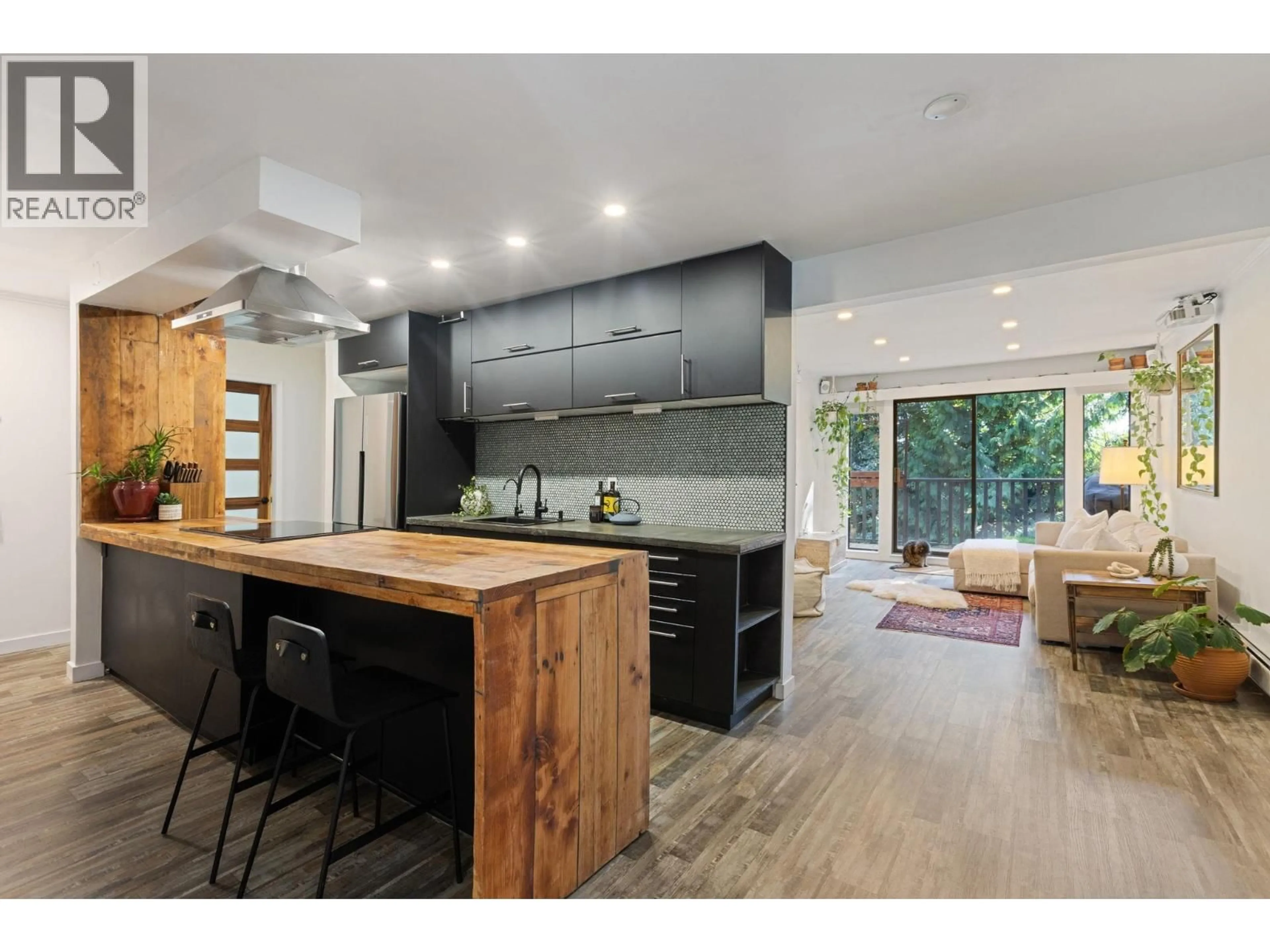 Open concept kitchen, wood/laminate floor for 56 - 1825 PURCELL WAY, North Vancouver British Columbia V7J3H4