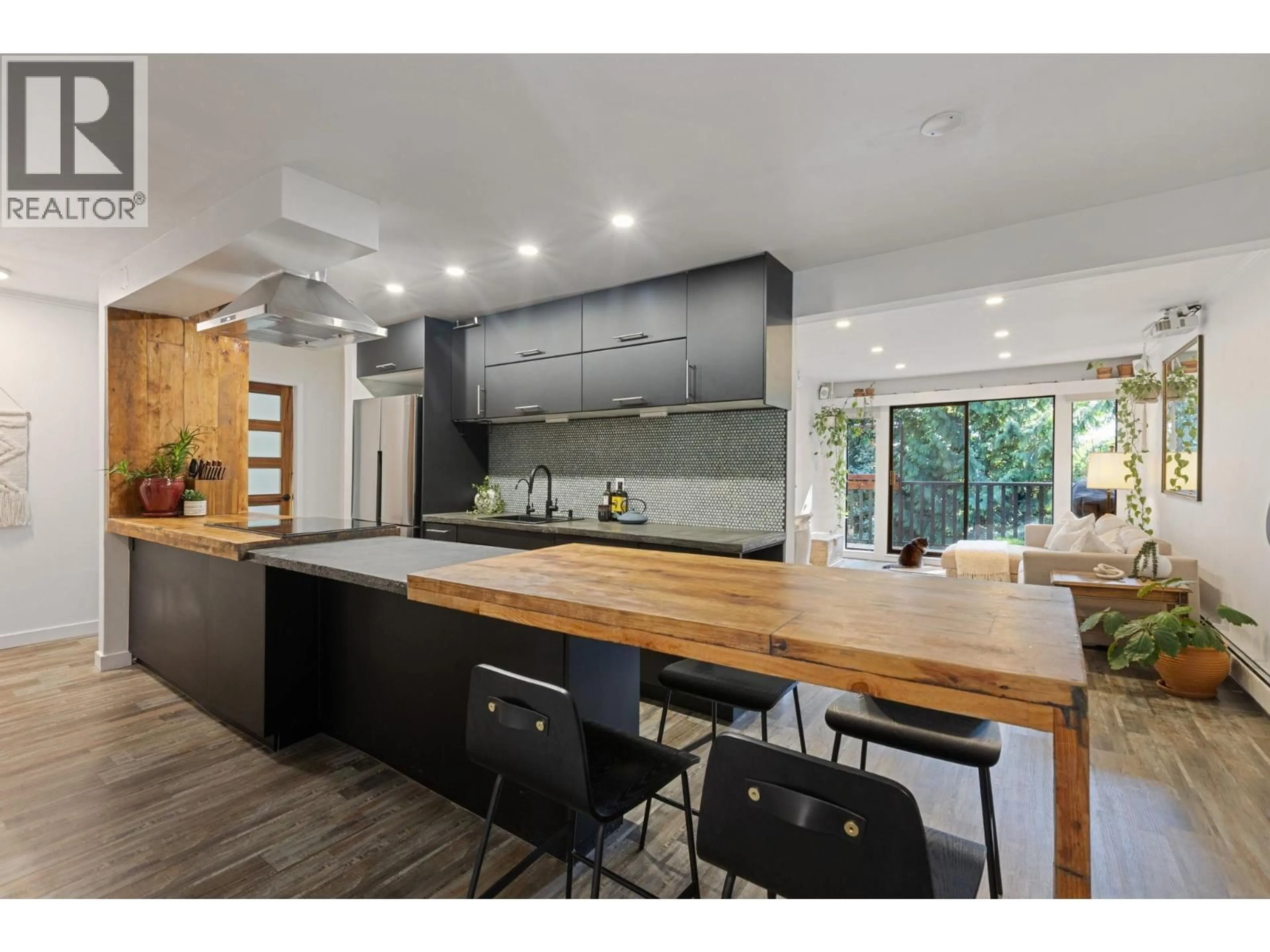 Open concept kitchen, wood/laminate floor for 56 - 1825 PURCELL WAY, North Vancouver British Columbia V7J3H4