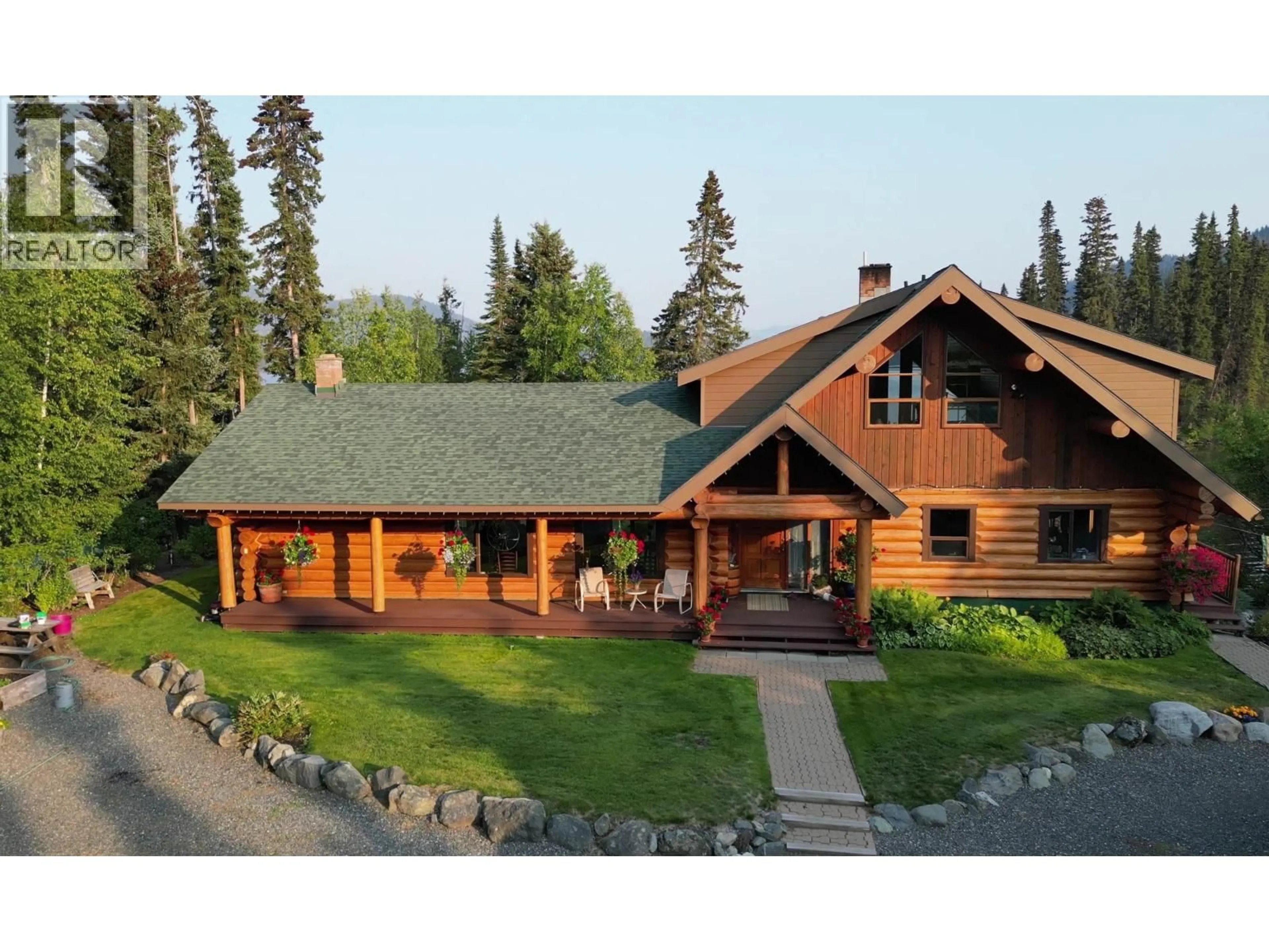 Home with vinyl exterior material, mountain view for 8528 LITTLE FORT 24 HIGHWAY, Bridge Lake British Columbia V0K1E0