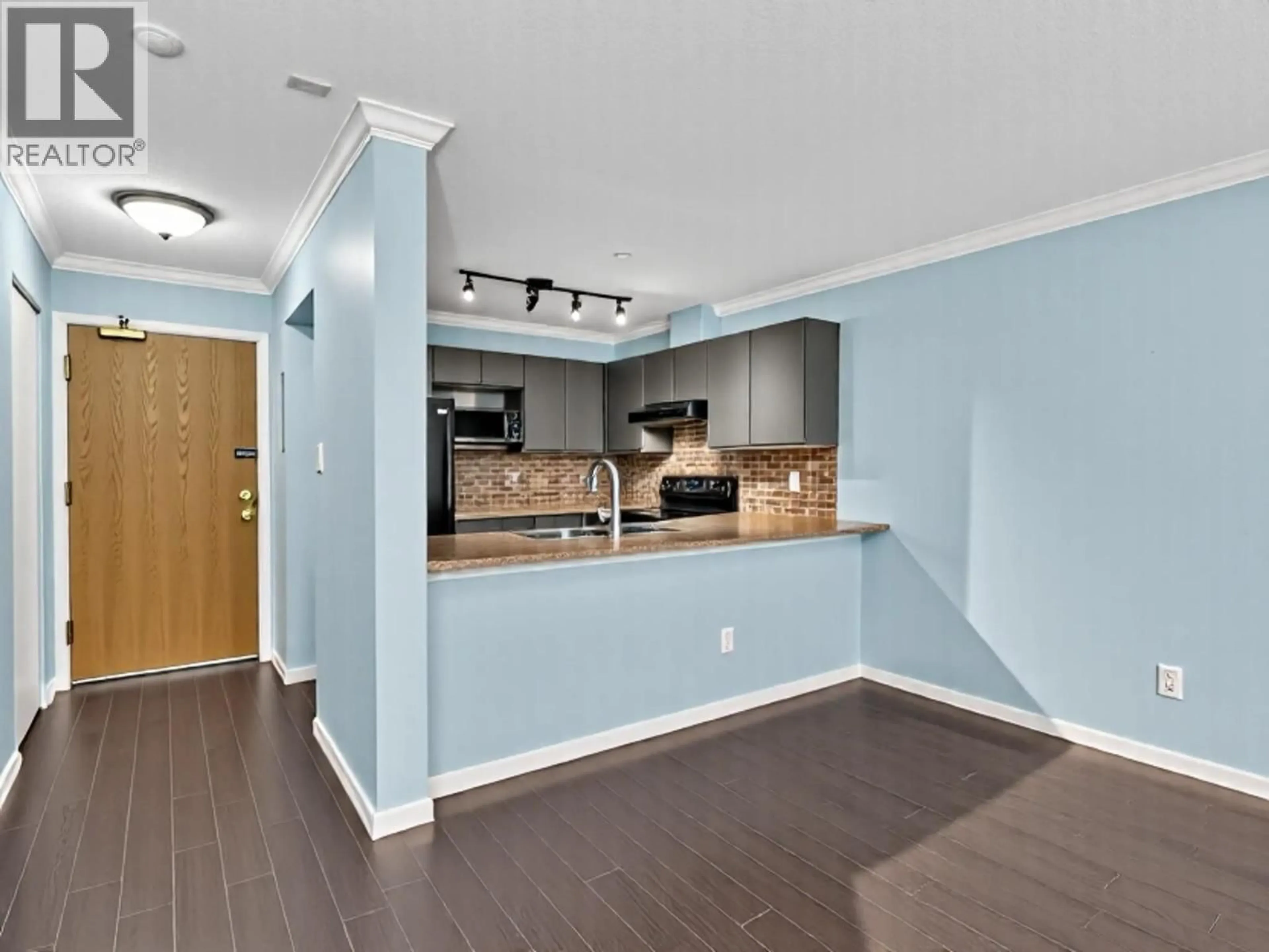Open concept kitchen, wood/laminate floor for 307 - 1219 JOHNSON STREET, Coquitlam British Columbia V3B7L5