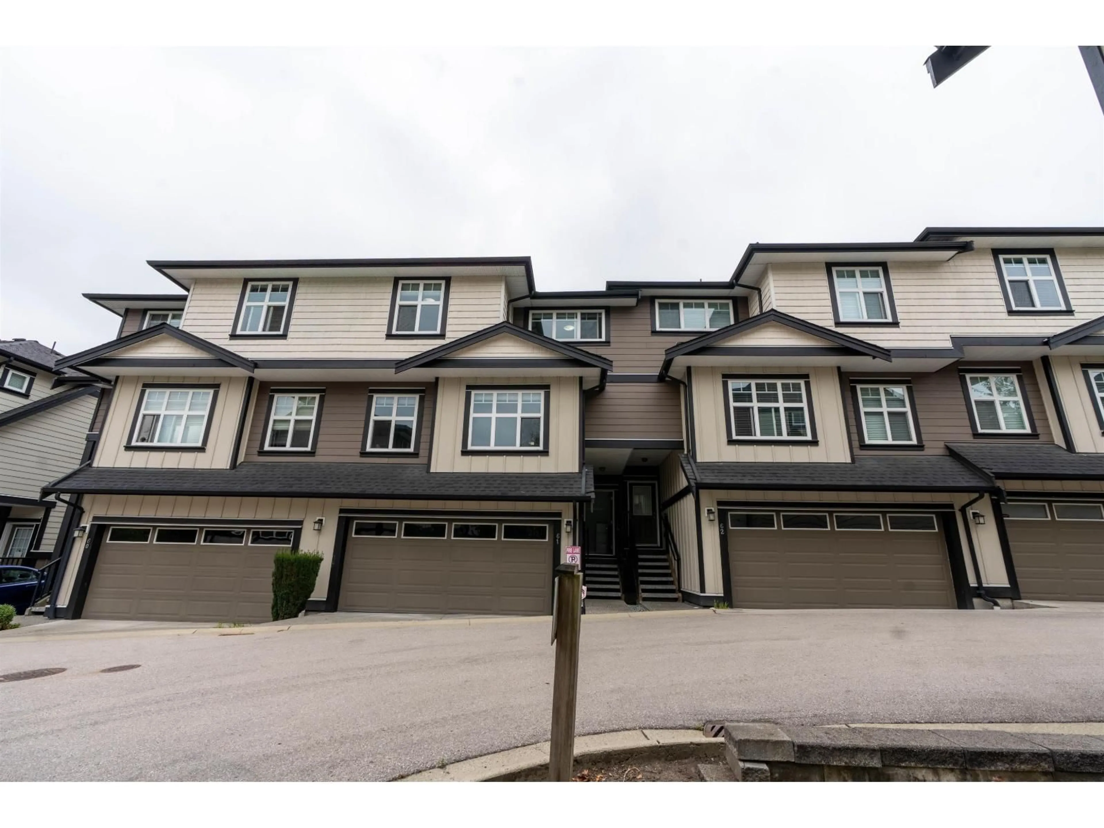 A pic from outside/outdoor area/front of a property/back of a property/a pic from drone, street for 61 - 6350 142, Surrey British Columbia V3X1C8