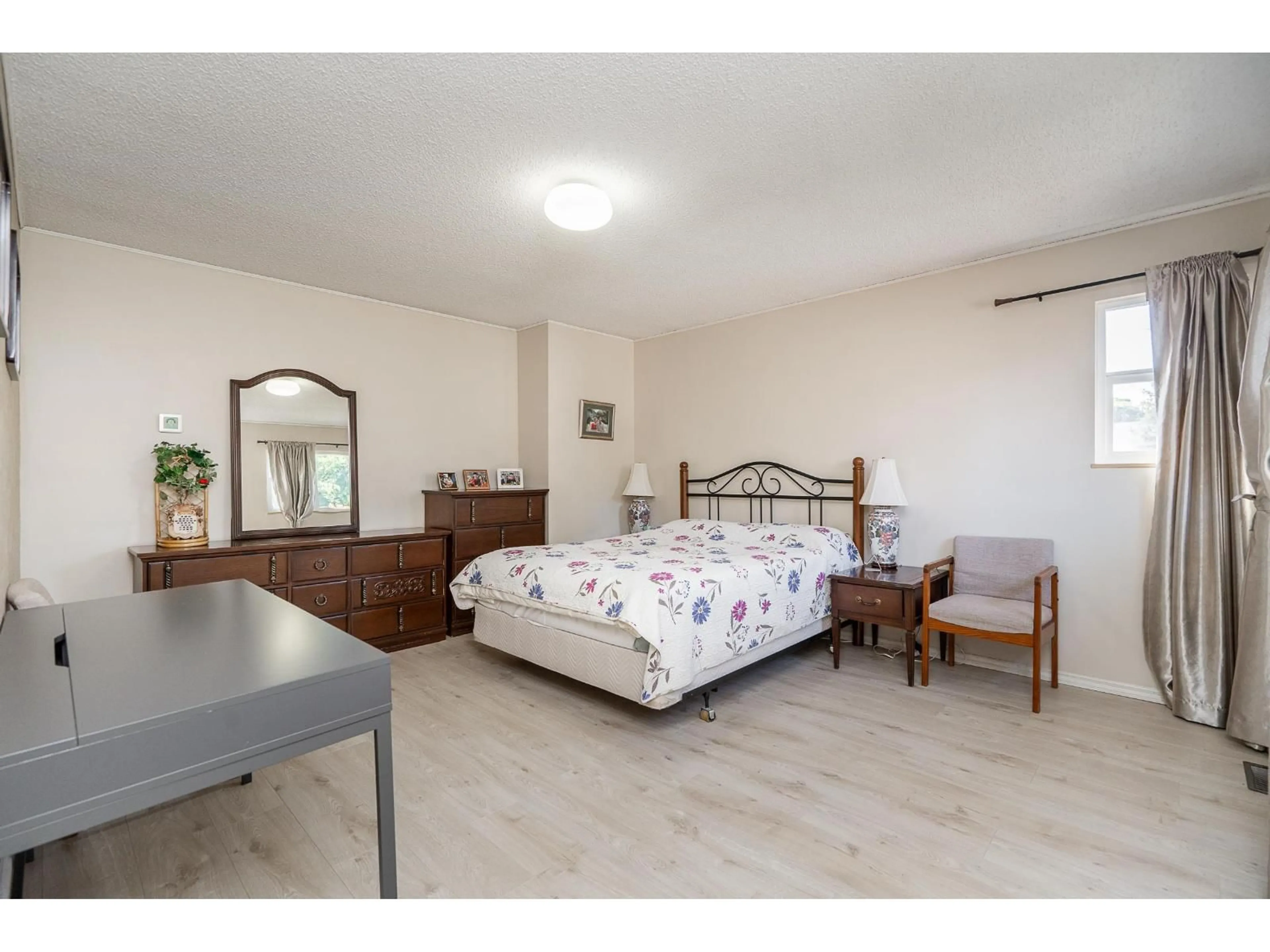Bedroom with bed, wood/laminate floor for 9674 155A, Surrey British Columbia V3R7N8