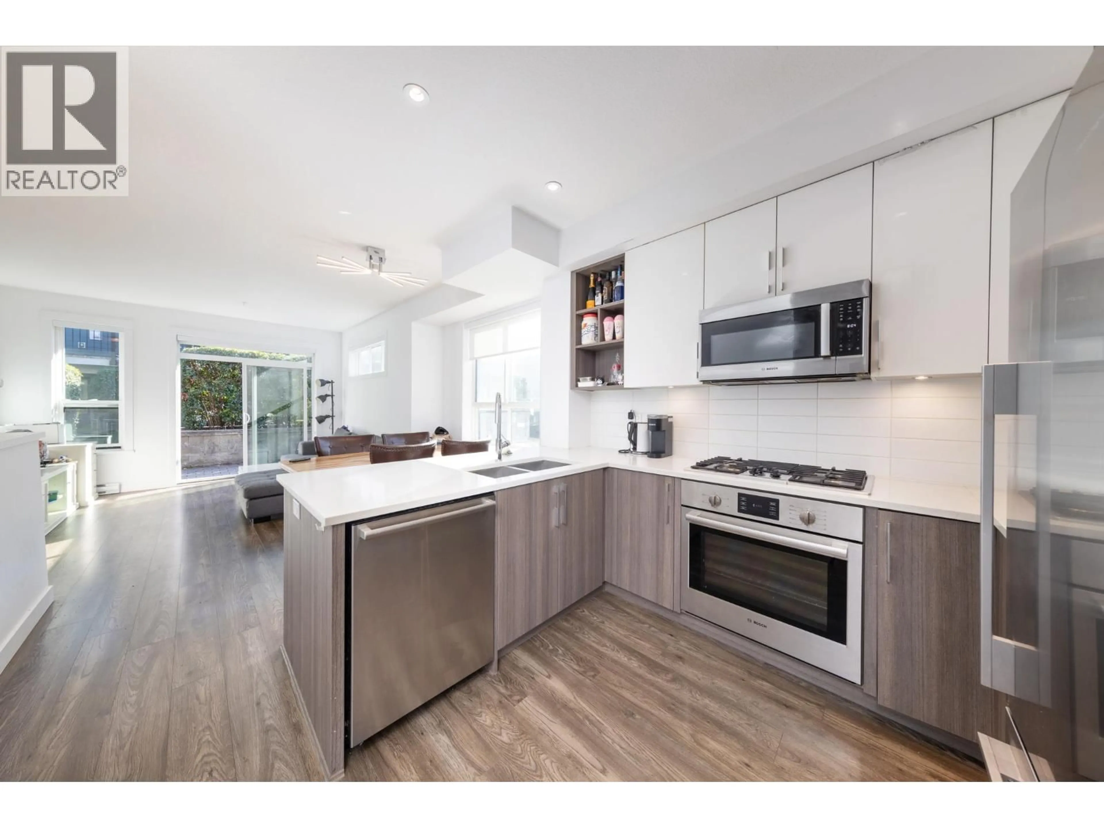 Open concept kitchen, unknown for 21 - 7039 MACPHERSON AVENUE, Burnaby British Columbia V5J4N4