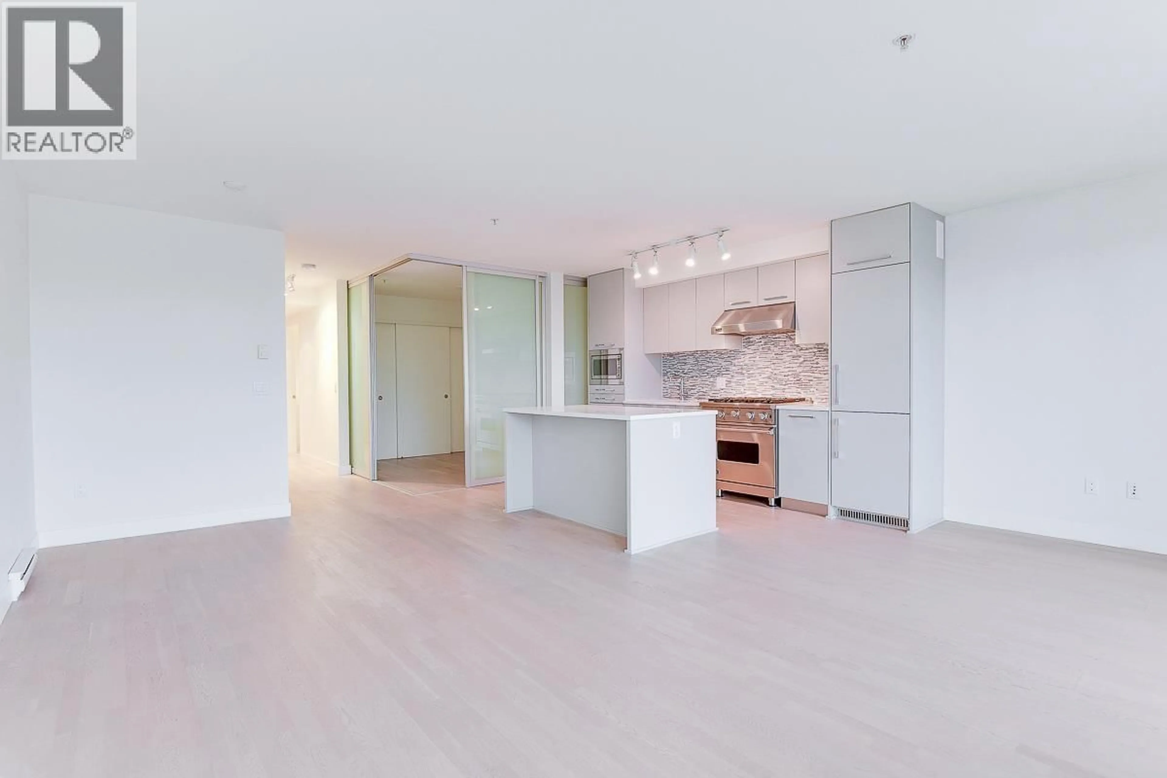 Open concept kitchen, unknown for 309 - 4355 W 10TH AVENUE, Vancouver British Columbia V6R2H6