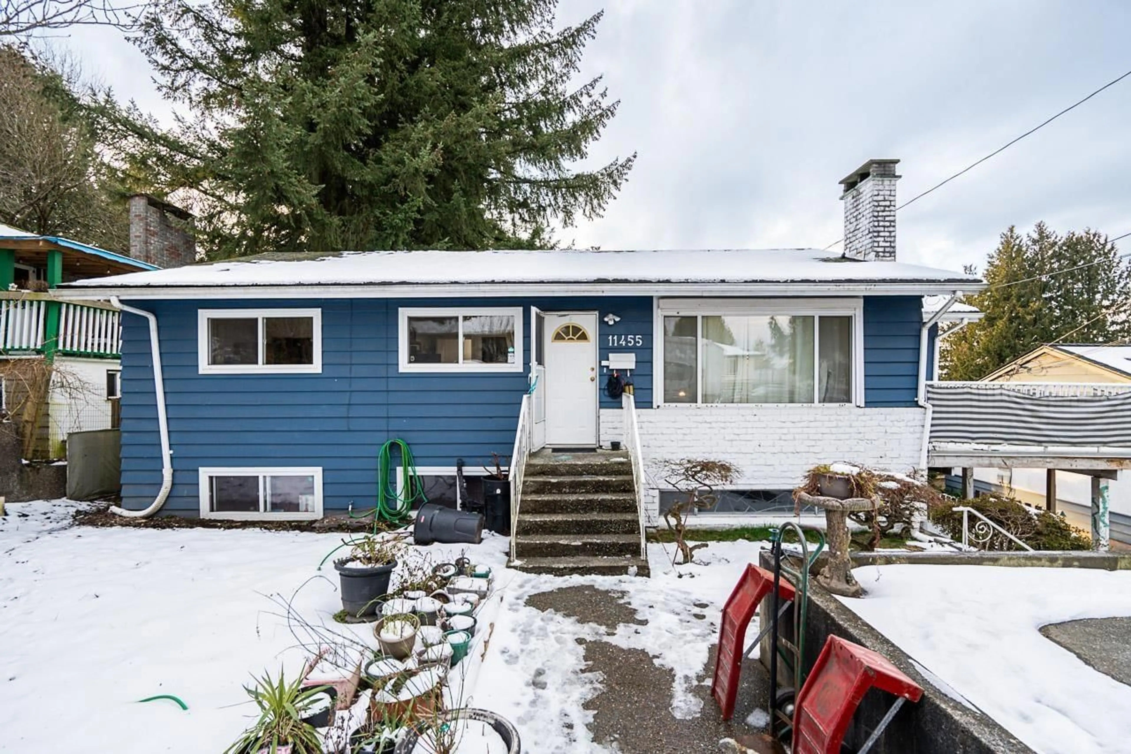 Home with vinyl exterior material, street for 11455 139A, Surrey British Columbia V3R3E9