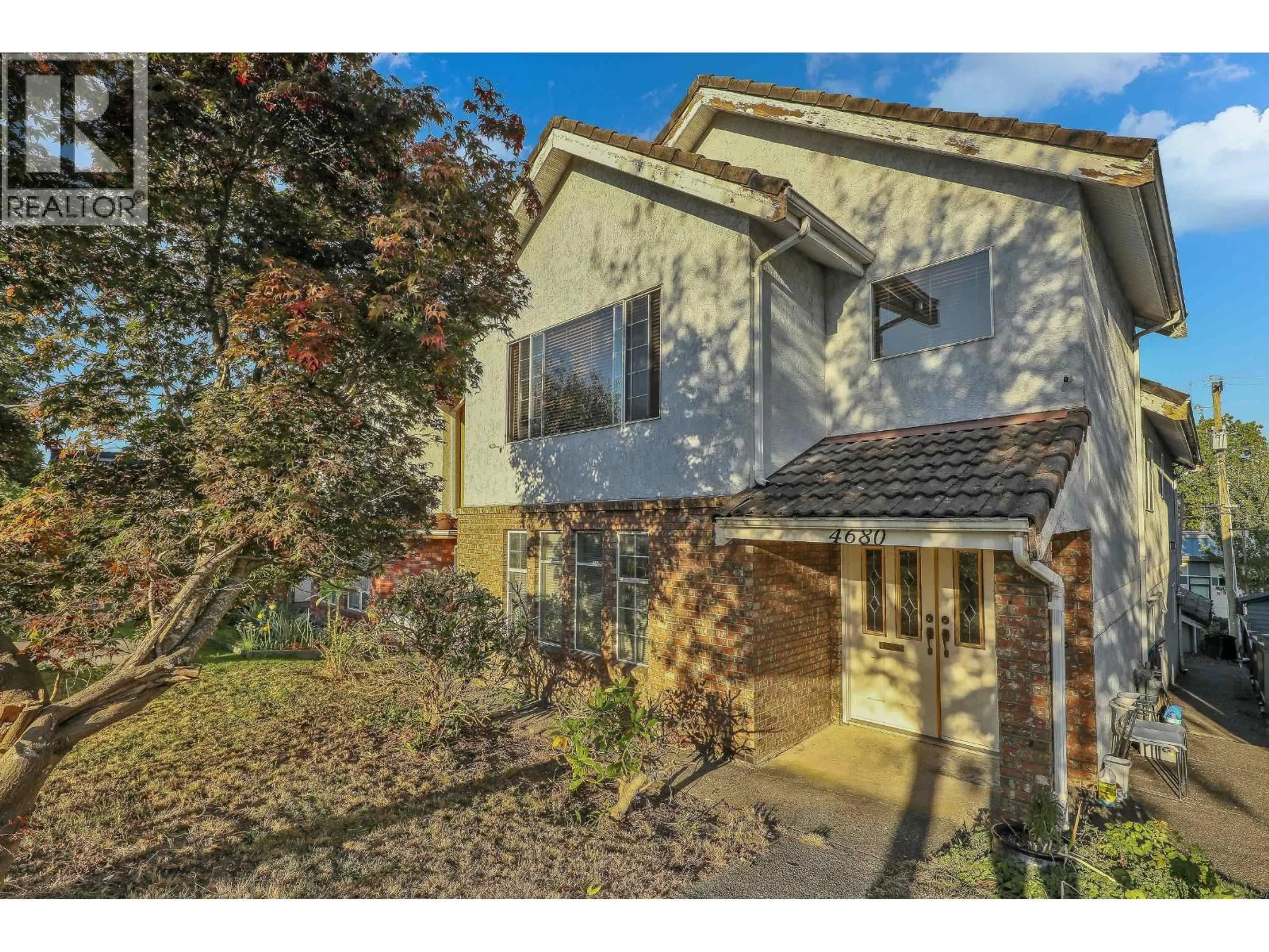A pic from outside/outdoor area/front of a property/back of a property/a pic from drone, street for 4680 HOY STREET, Vancouver British Columbia V5R4N4