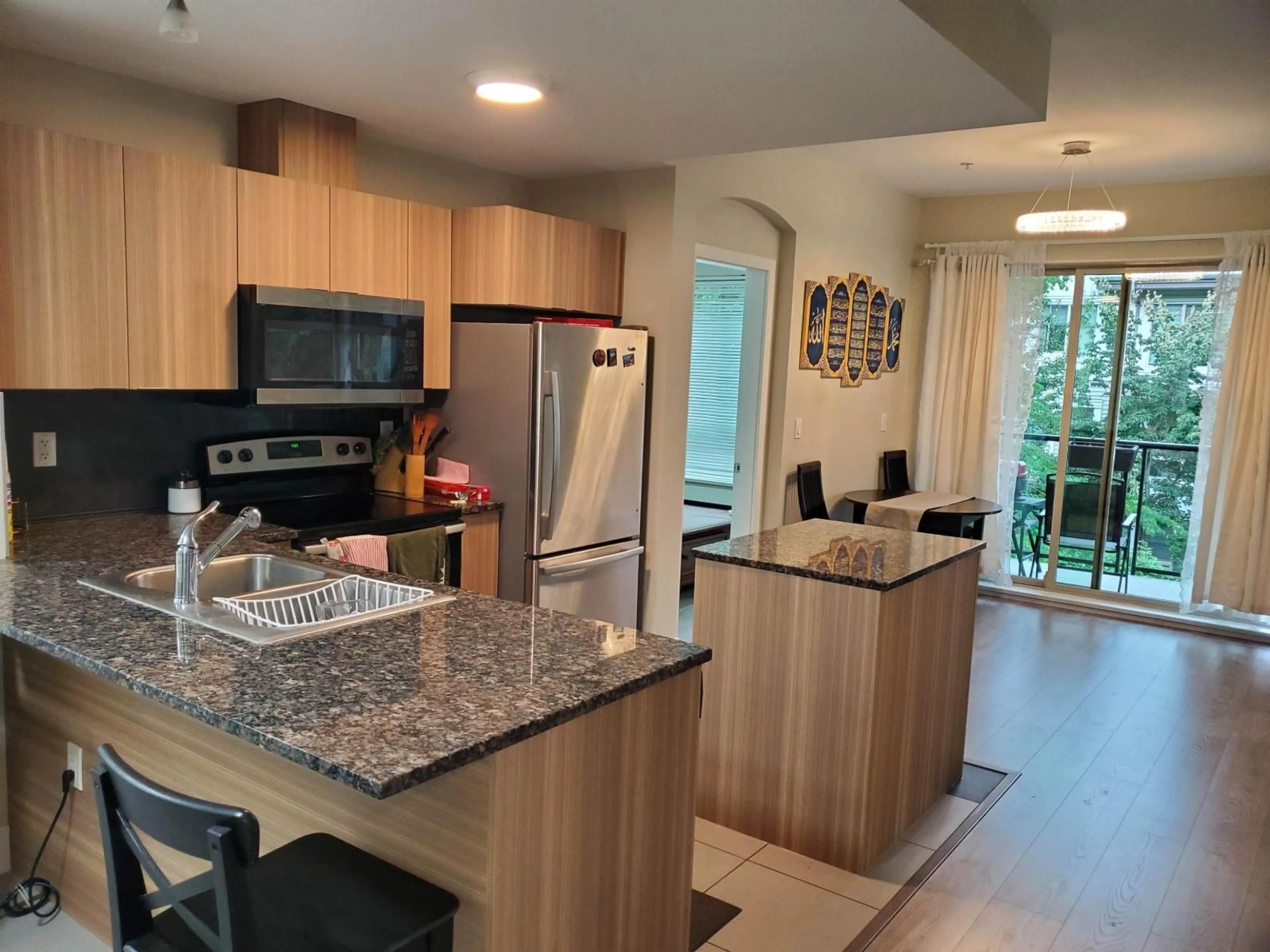 Open concept kitchen, unknown for 211 - 6688 120, Surrey British Columbia V3W1T8