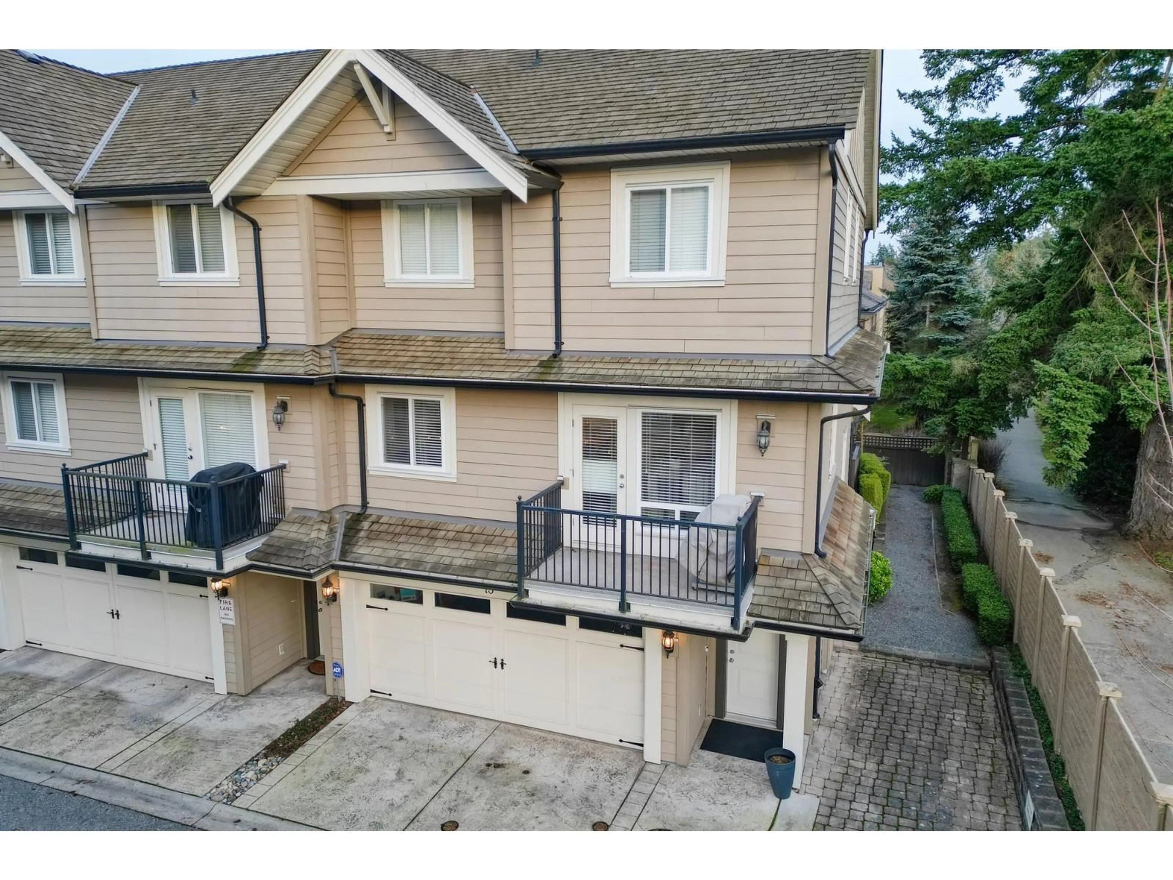A pic from outside/outdoor area/front of a property/back of a property/a pic from drone, street for 13 - 3268 156A, Surrey British Columbia V3Z9T1