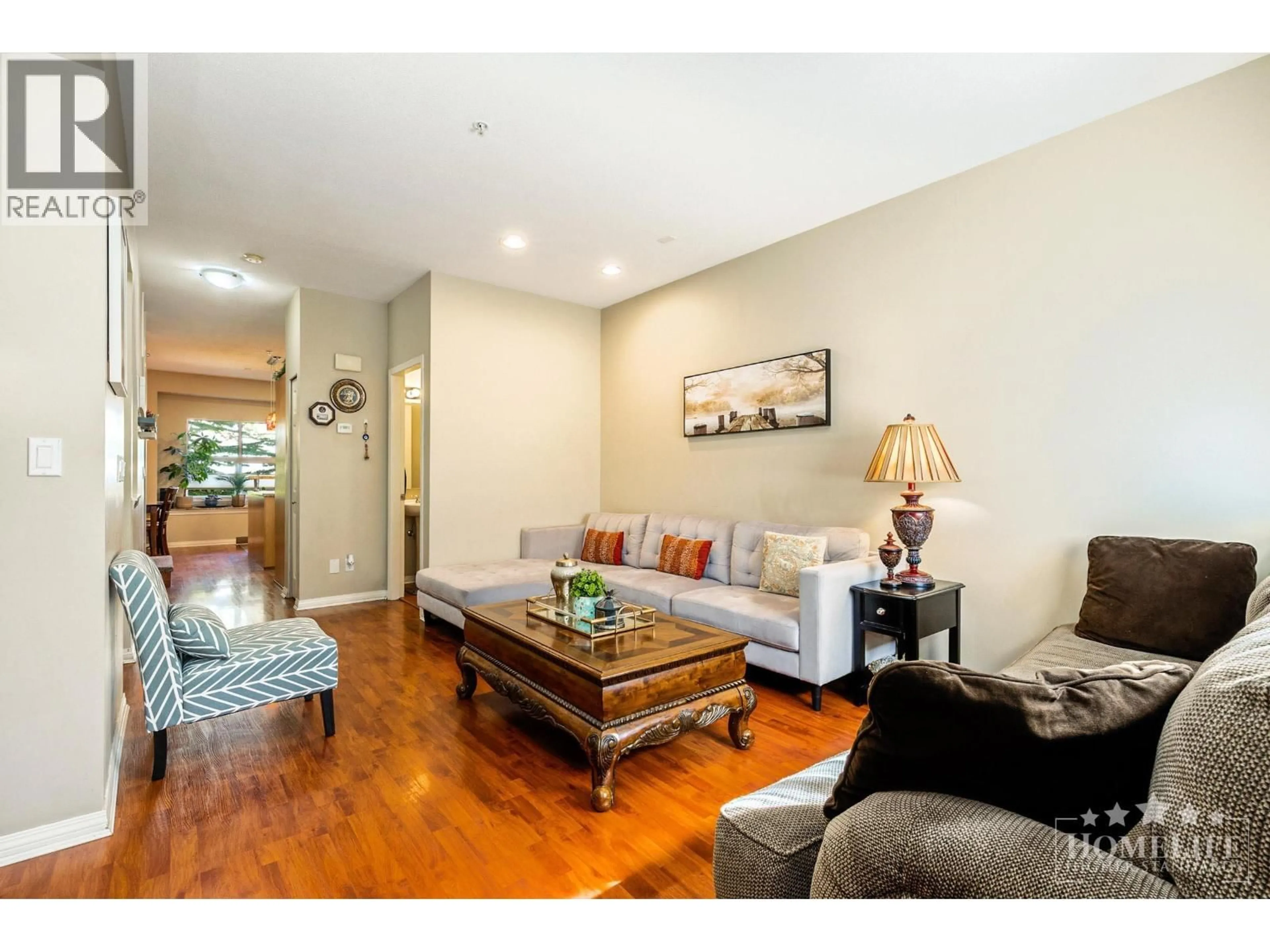 Living room with furniture, wood/laminate floor for 64 - 1055 RIVERWOOD GATE, Port Coquitlam British Columbia V3B8C3