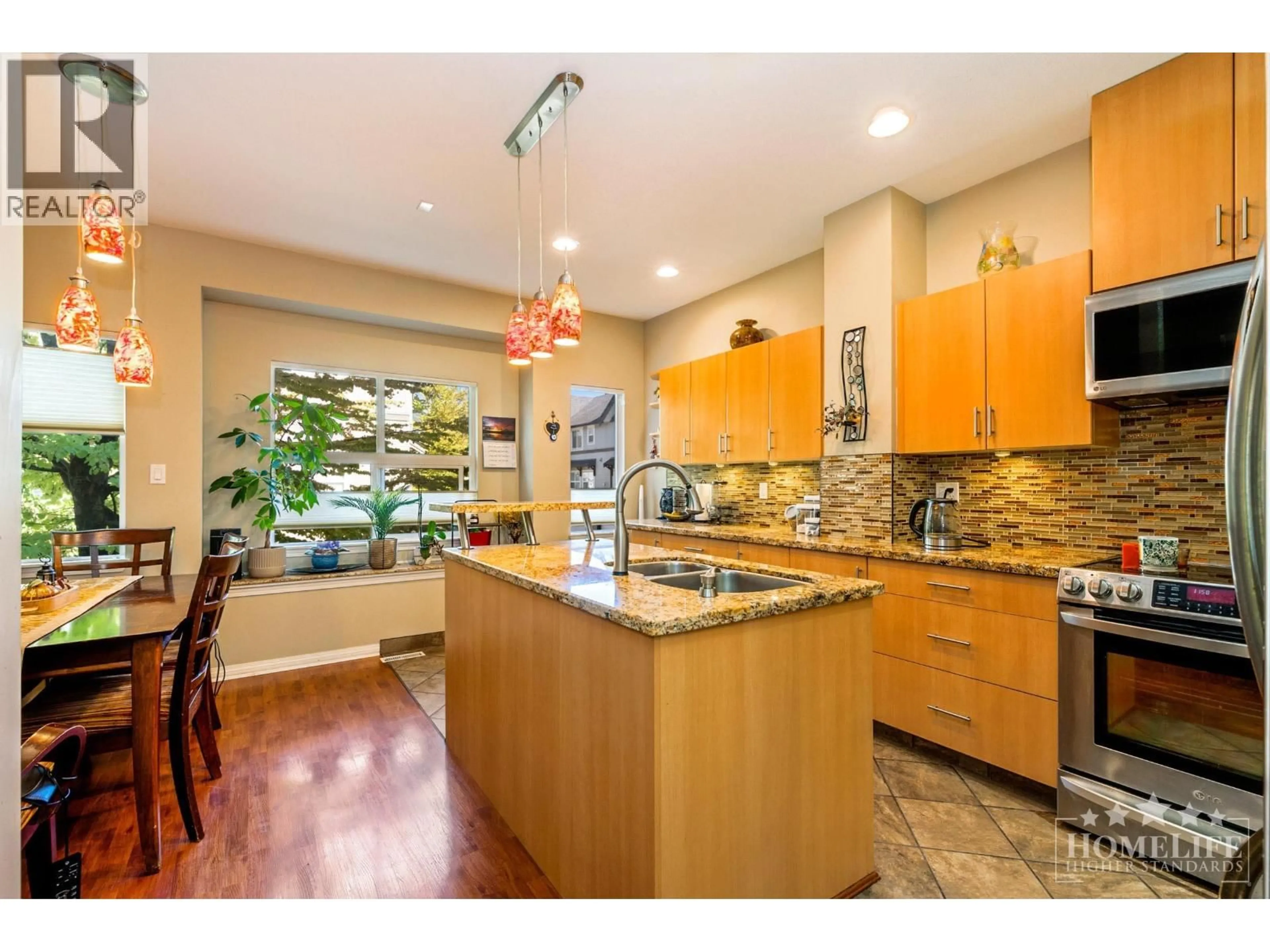 Open concept kitchen, ceramic/tile floor for 64 - 1055 RIVERWOOD GATE, Port Coquitlam British Columbia V3B8C3