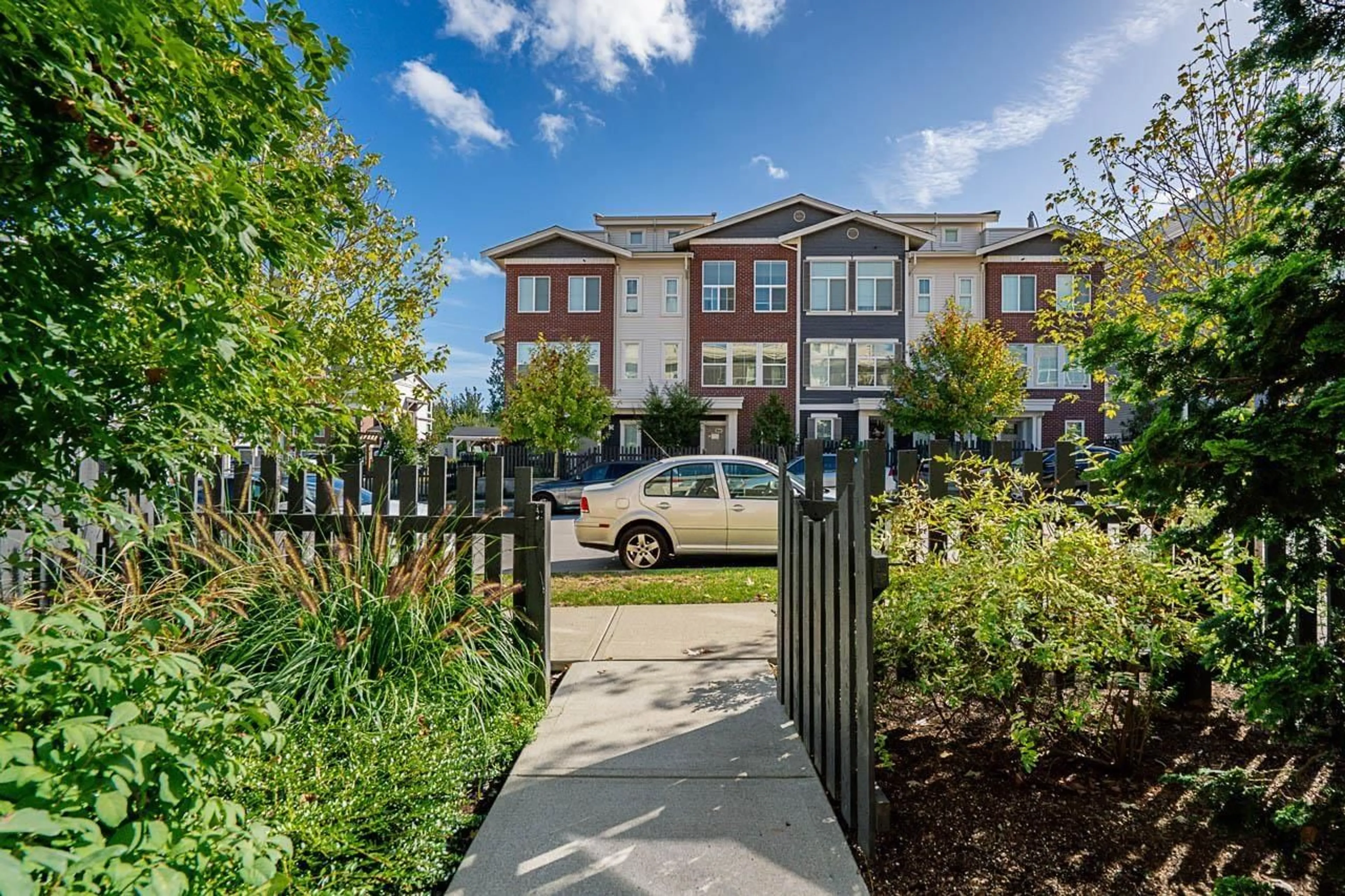 A pic from outside/outdoor area/front of a property/back of a property/a pic from drone, street for 2 - 8371 202B, Langley British Columbia V2Y4K6