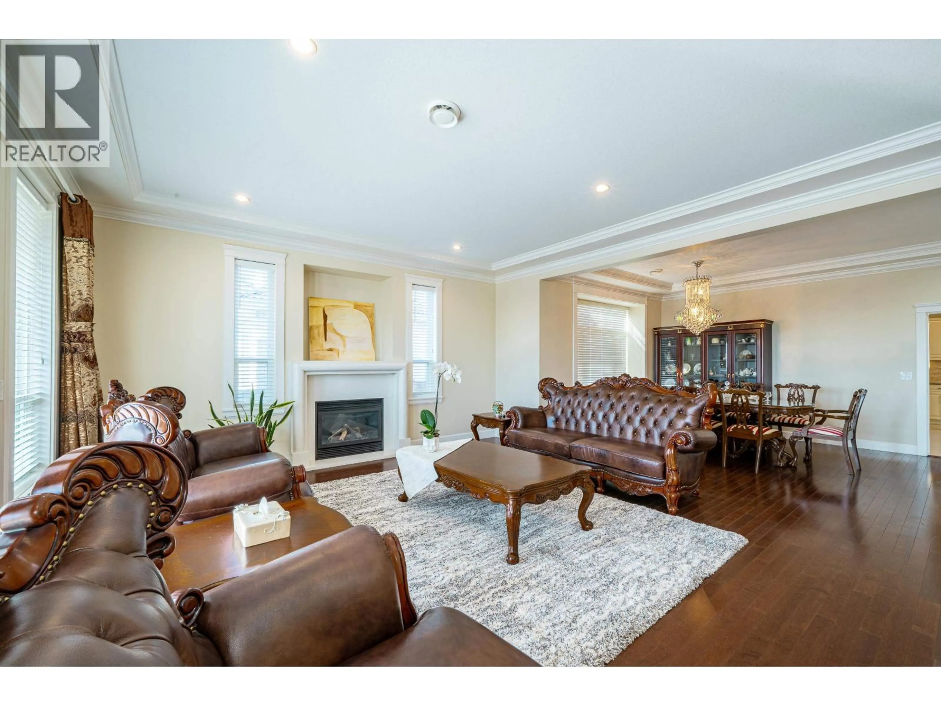 Living room with furniture, wood/laminate floor for 5511 MCKEE STREET, Burnaby British Columbia V5J2T9