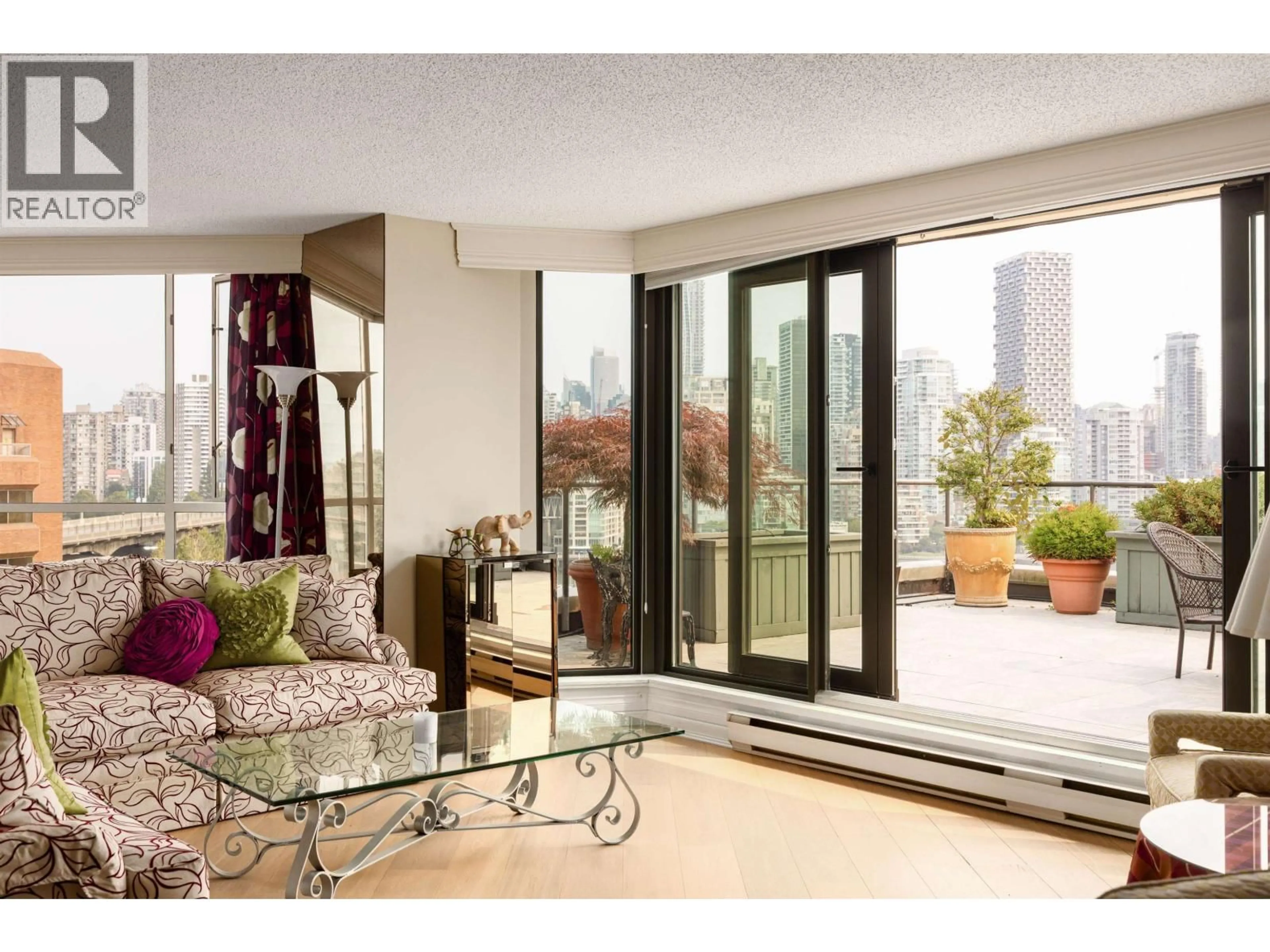 Living room with furniture, unknown for 1009 - 1450 PENNYFARTHING DRIVE, Vancouver British Columbia V6J4X8